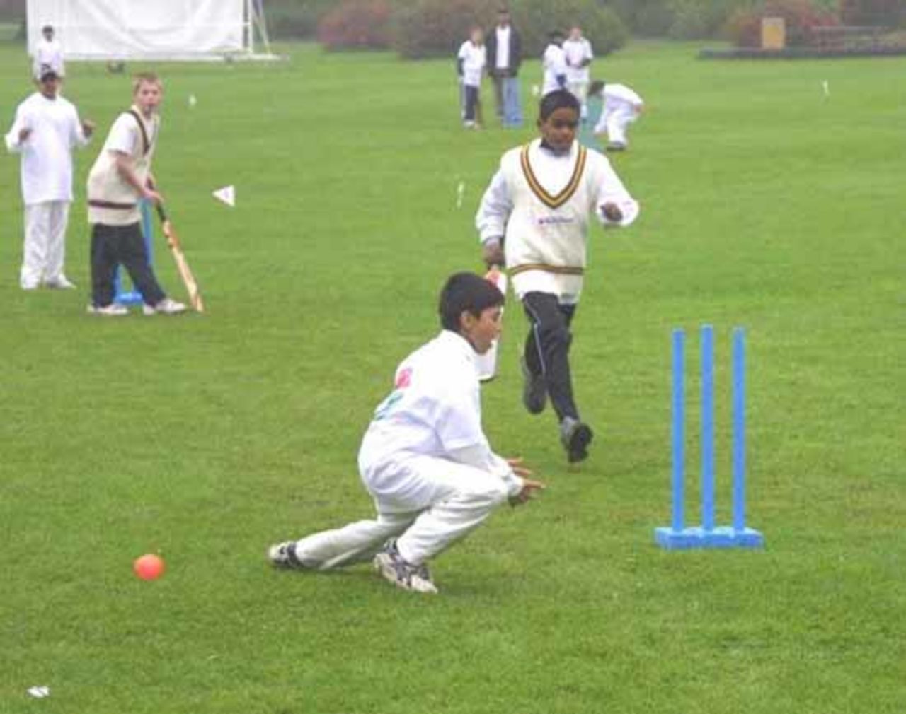 A close run out chance in a group match, ECC Cricket Weekend