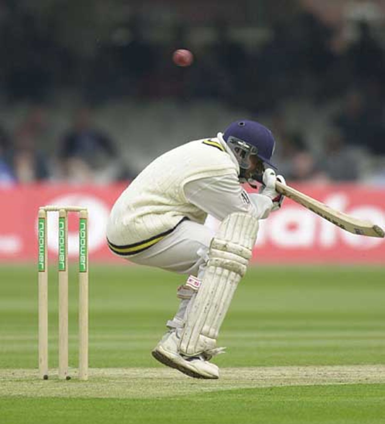 Aravinda de Silva ducks under a bouncer from Andy Caddick, 1st Test Lord's May 2002