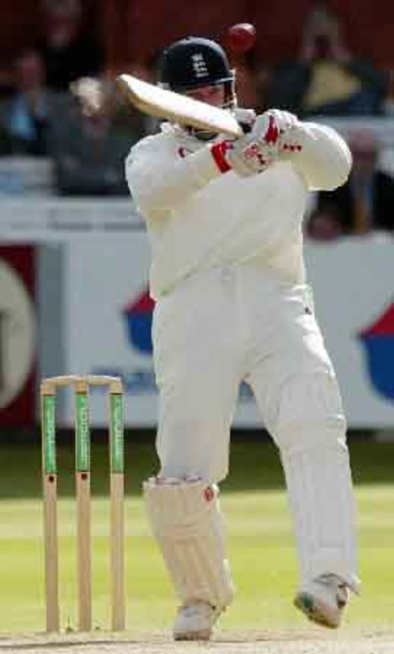 England batsman John Crawley hits a high ball from Sri Lankan bowler Ruchira Perera on the third day of the first test match at Lords, May 18, 2002.