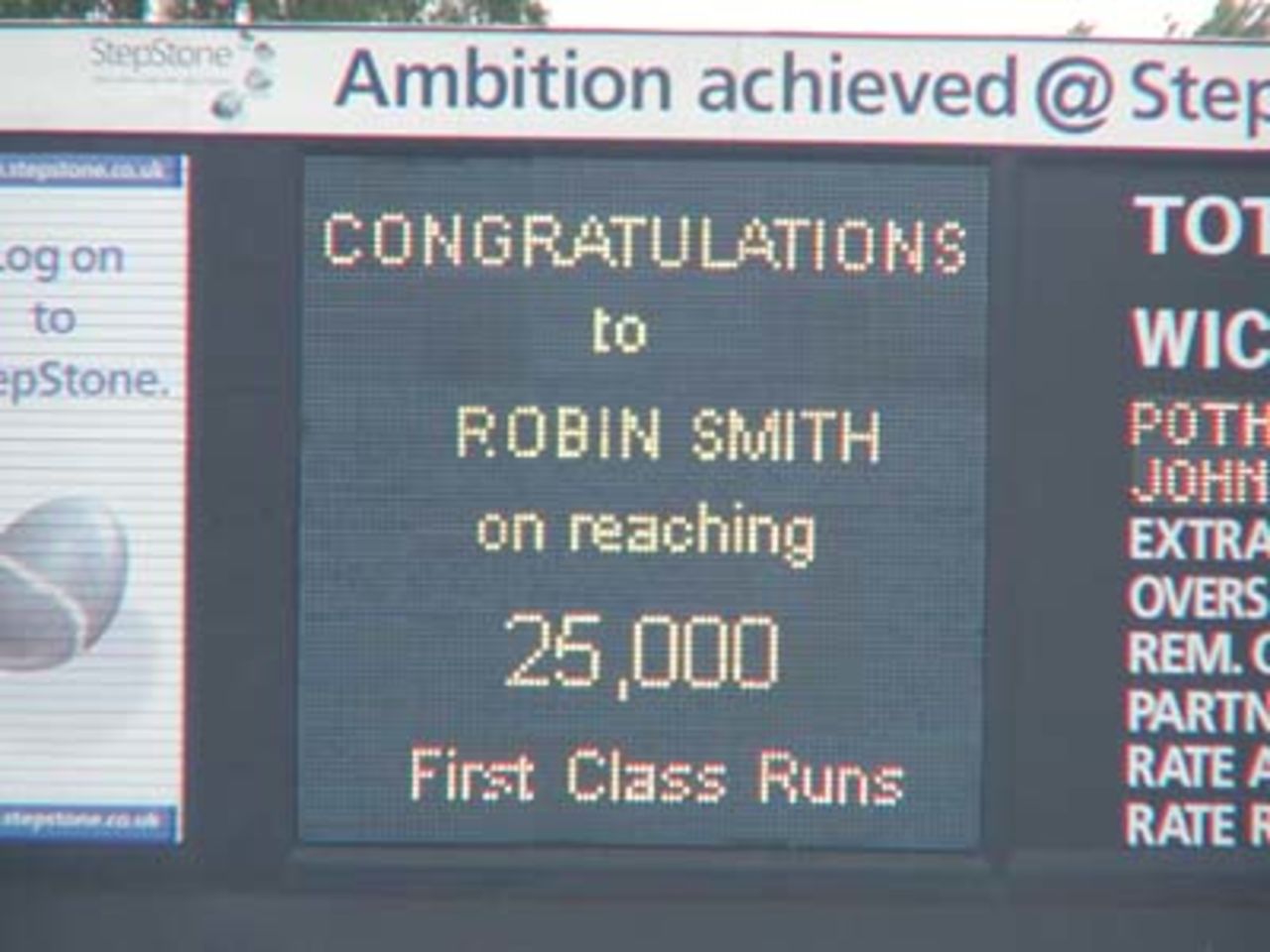 The Scoreboard at Edgbaston lights up Robin Smith's achievement of 25,000 first-class runs