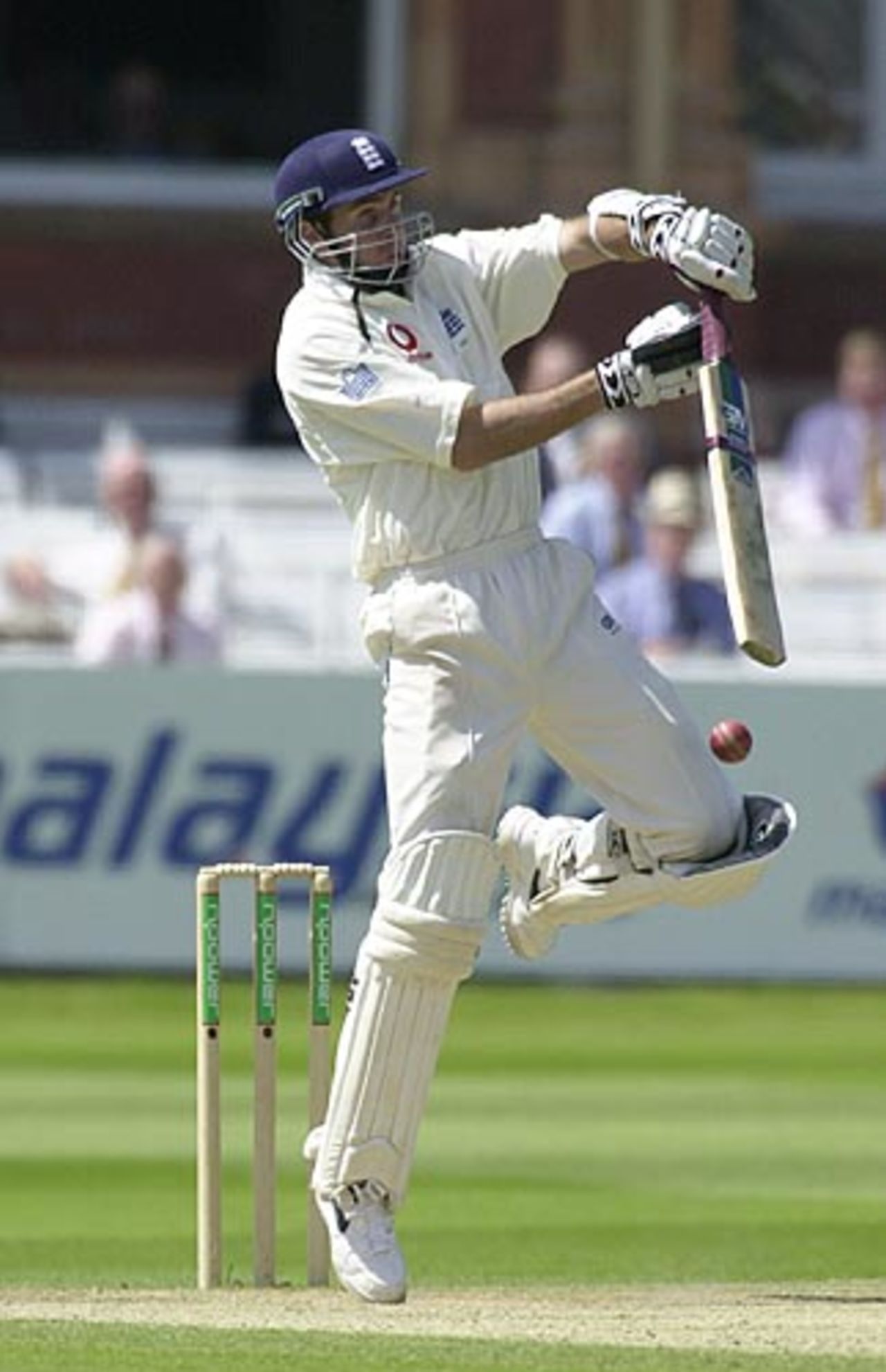 Michael Vaughan in airborne defence from a Vaas delivery, England v Sri Lanka, First Test, Lord's 2002