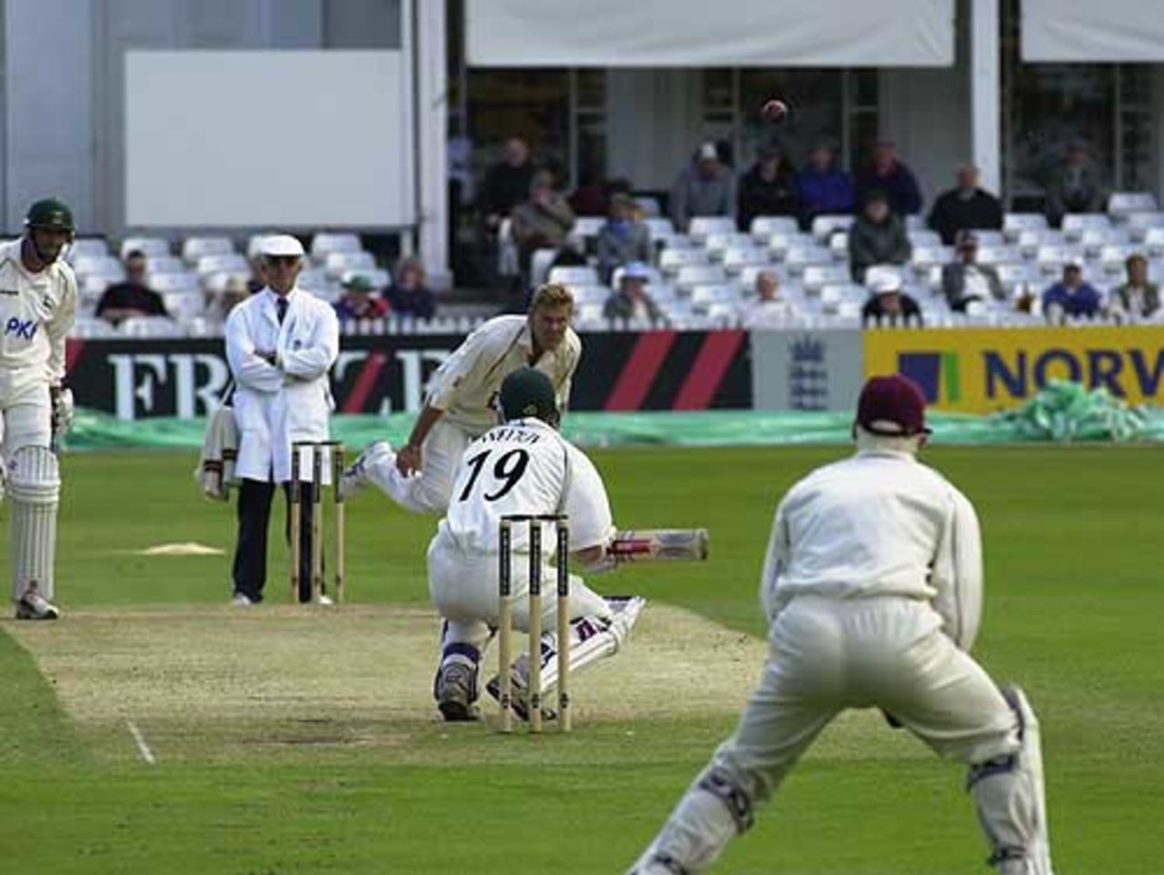 Northants Darren Cousins sends down a short ball to Guy Welton of Notts, Frizzell County Championship, Trent Bridge, 25 May 2002