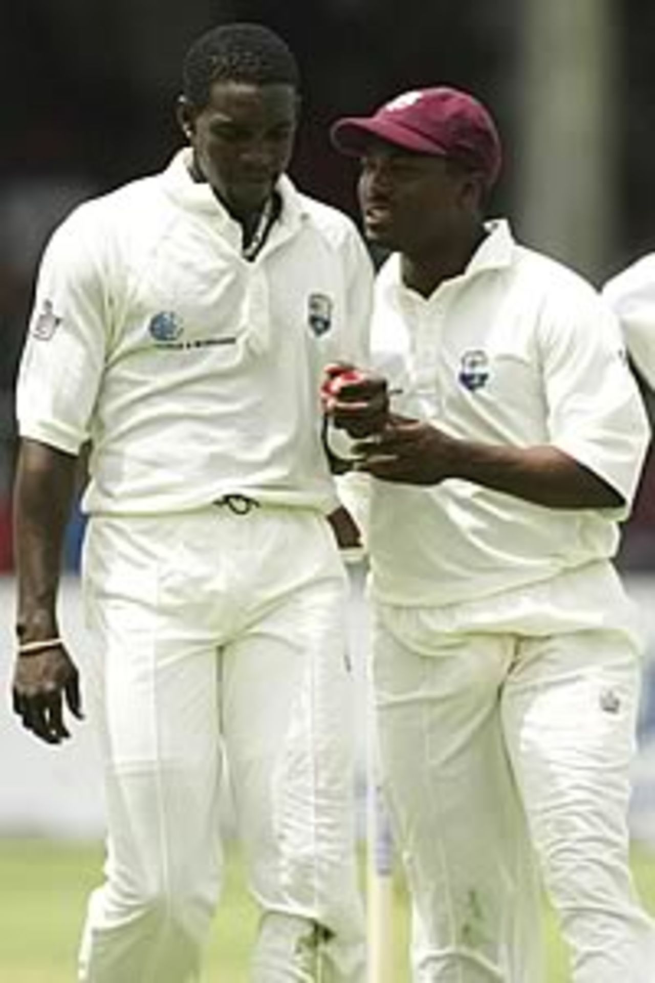 BRIDGETOWN, BARBADOS - MAY 1: Captain Brian Lara of the West Indies encourages his bowler Jermaine Lawson during day one of the Third Test between the West Indies and Australia on May1, 2003 at Kensington Oval in Bridgetown, Barbados.