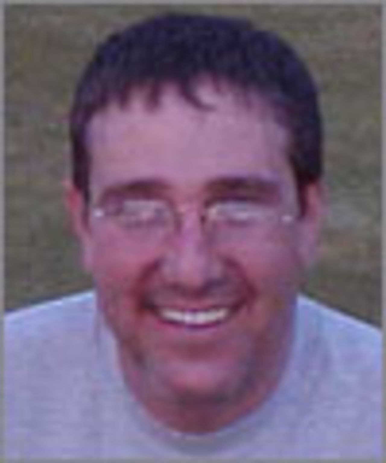 A portrait of John Pilling