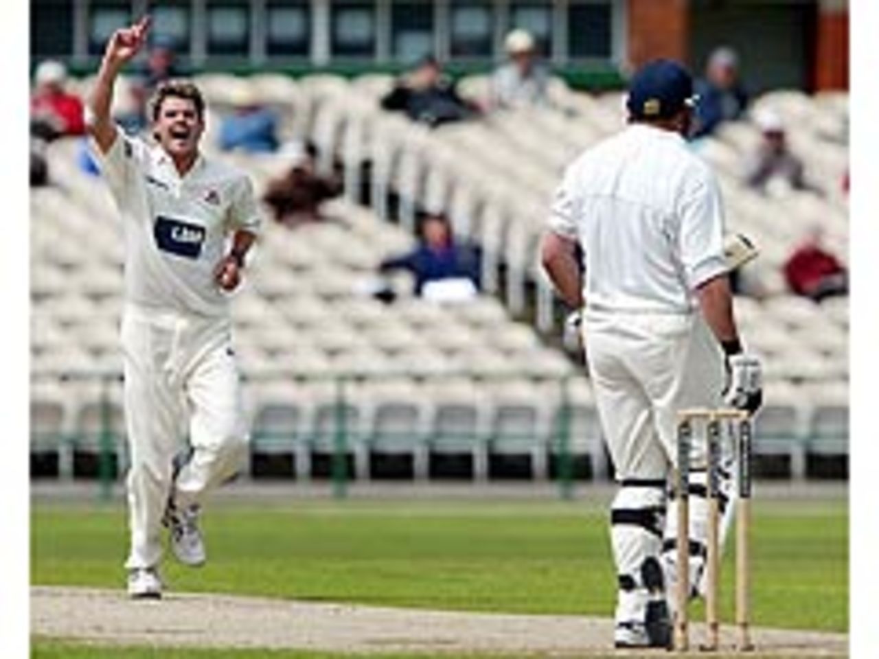 James Anderson celebrates dismissing Darren Robinson on his way to a hat-trick for Lancashire against Essex