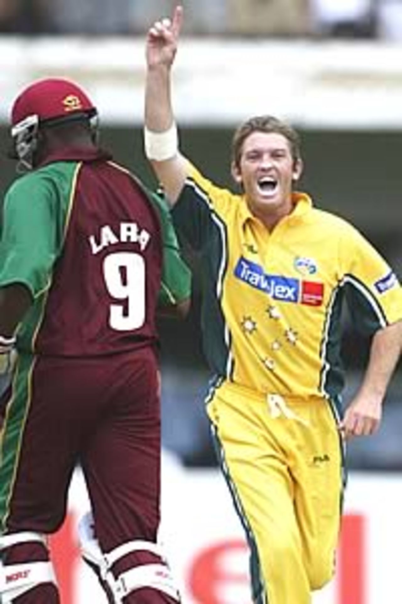 KINGSTON, JAMAICA - MAY 17: Ian Harvey of Australia celebrates the wicket of Brian Lara of the West Indies during the 1st One Day International between the West Indies and Australia on May 17, 2003 at Sabina Park Kingston, Jamaica.