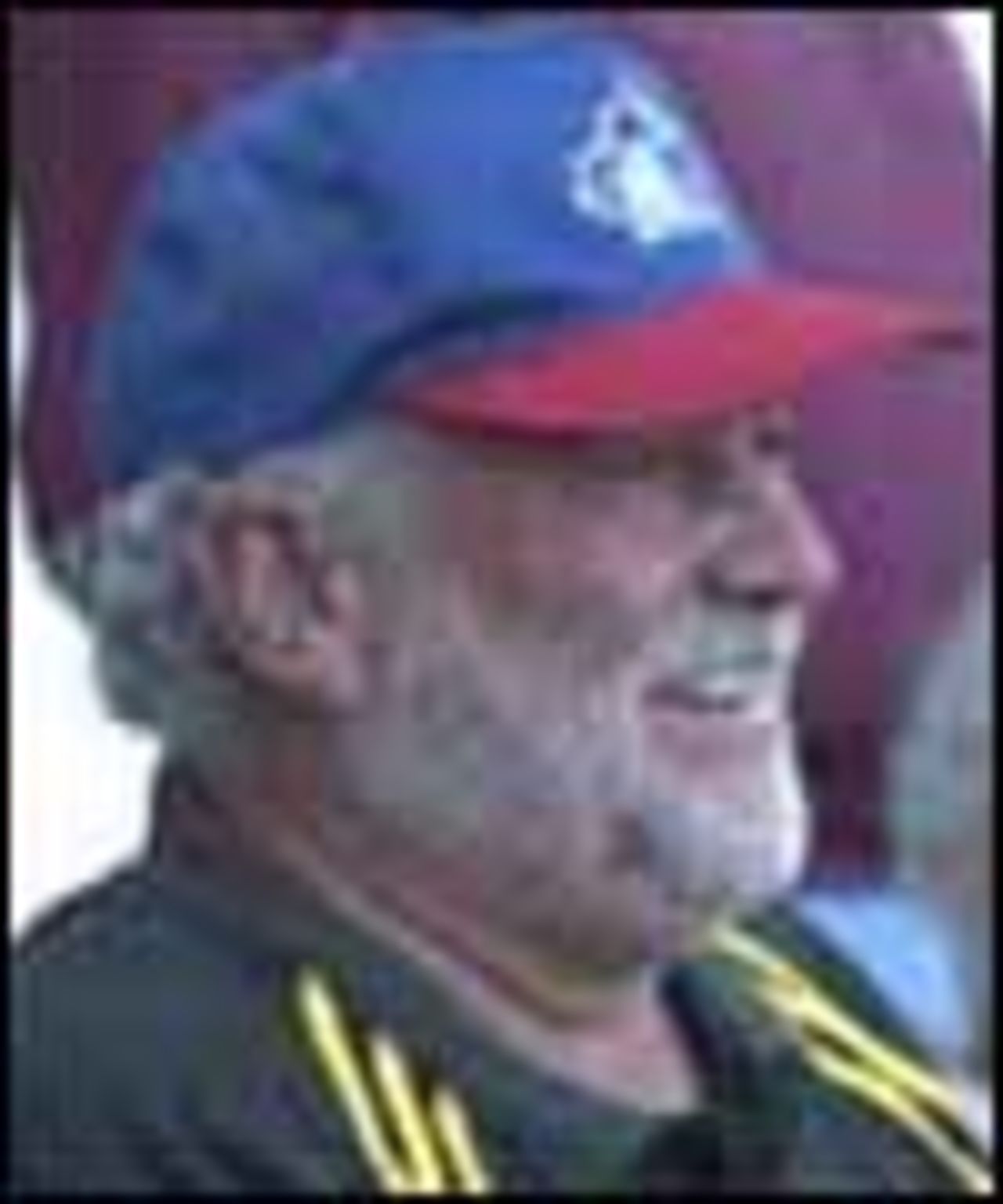 Former Rawtenstall professional Dave Orchard enjoys the floodlit action at his old club