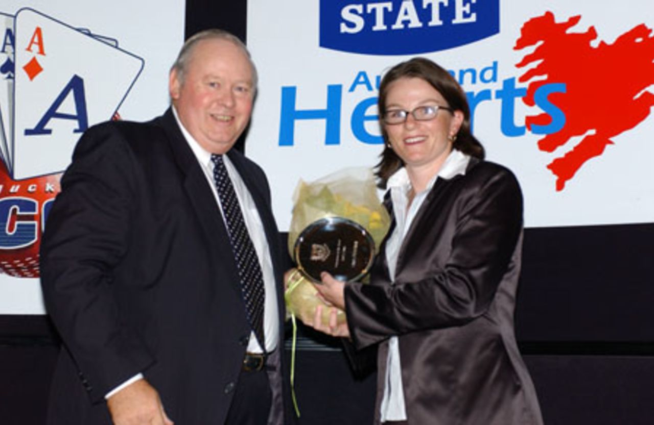 Auckland women's player Emily Drumm (right) is presented the women's bowler of the year award by Auckland Cricket Association president Ray Hopkins. Auckland Cricket Association awards dinner at the ASB Bank Lounge, Eden Park, Auckland, 2 April 2003.