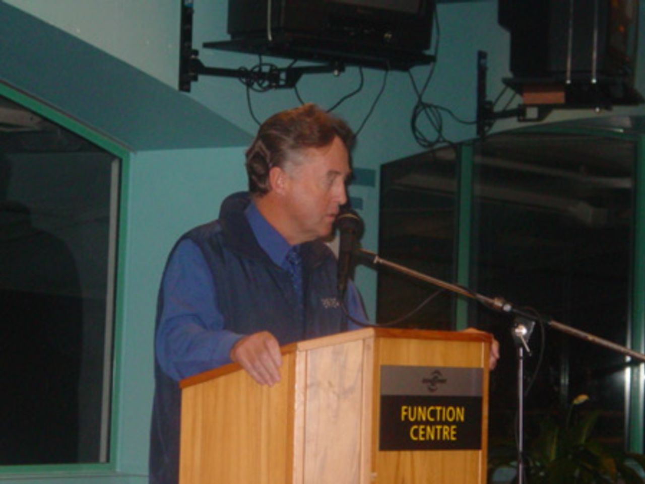 Auckland Cricket Association club chairman Rex Smith opens the prizegiving. Crown Relocations Auckland Association club prizegiving evening, West Stand, Eden Park, Auckland, 13 May 2003.