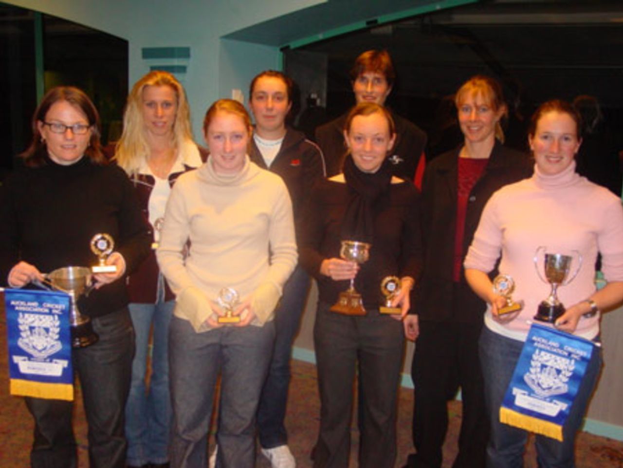 Members of the Parnell women's team with the Prichard Cup for winning the women's first grade limited overs championship. Crown Relocations Auckland Association club prizegiving evening, West Stand, Eden Park, Auckland, 13 May 2003.