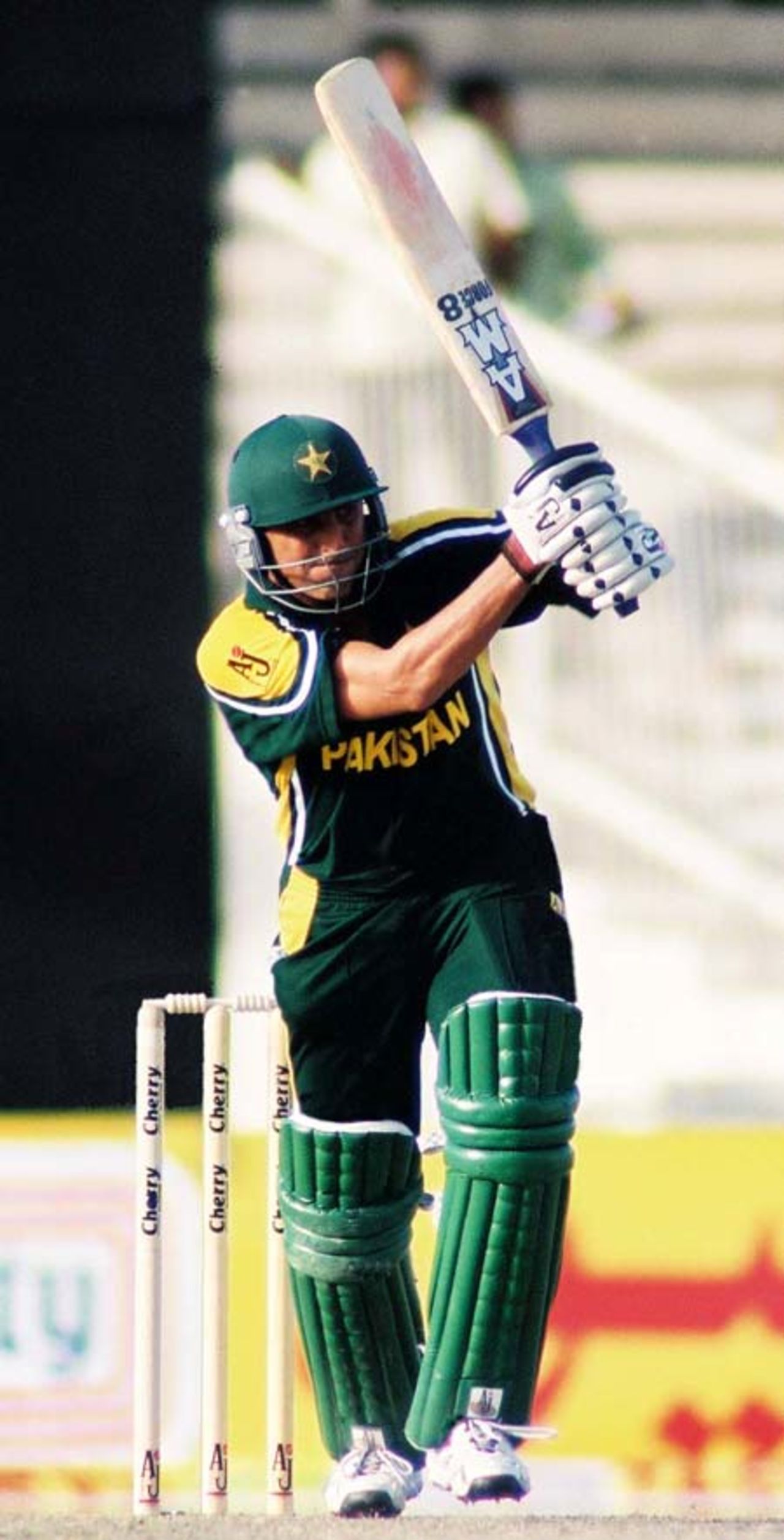 Younis Khan drives for a boundary,1st Match: Pakistan v Zimbabwe, Cherry Blossom Sharjah Cup, 3 April 2003