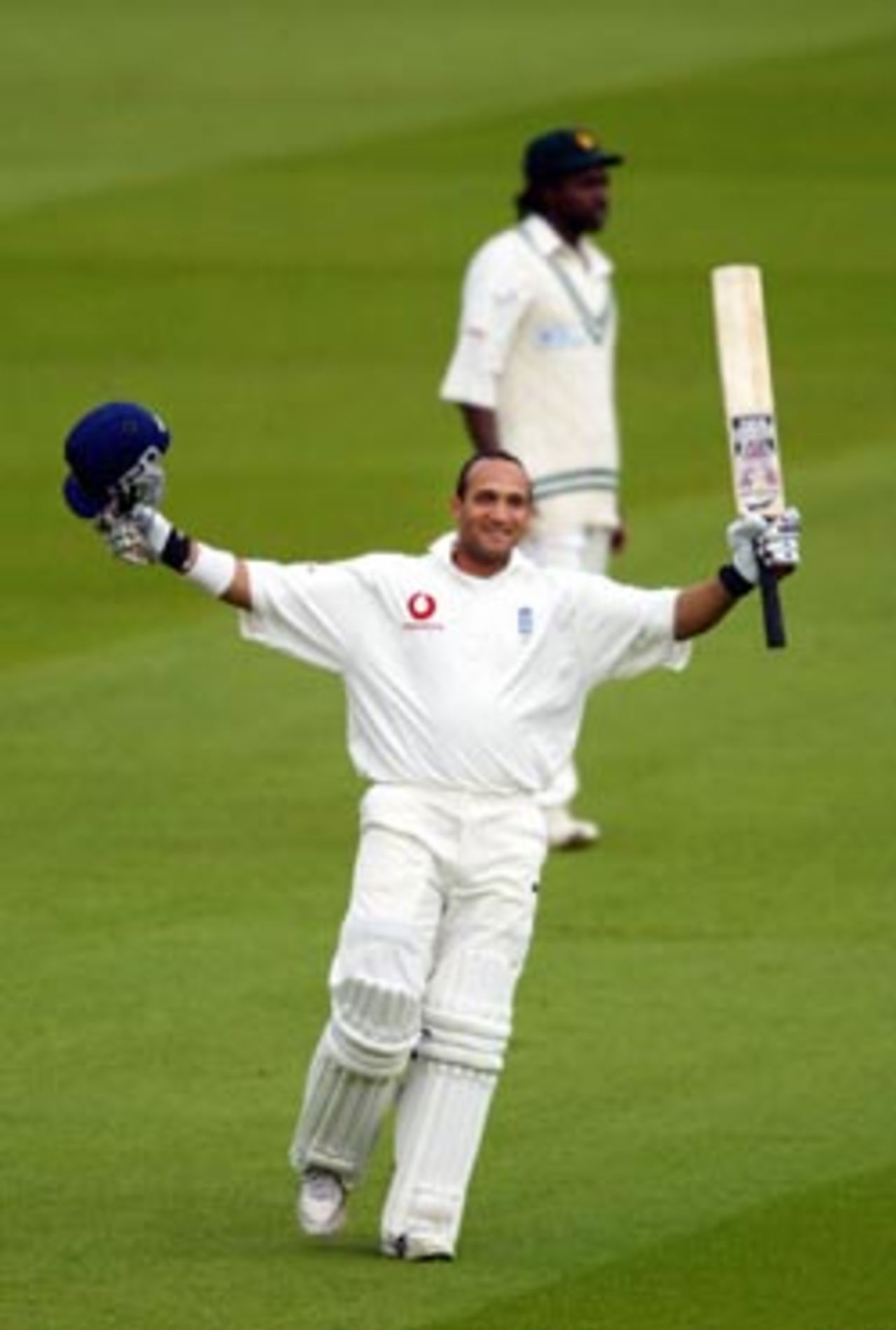 Mark Butcher celebrates a century during the second day of the Npower 1st test against Zimbabwe at Lords