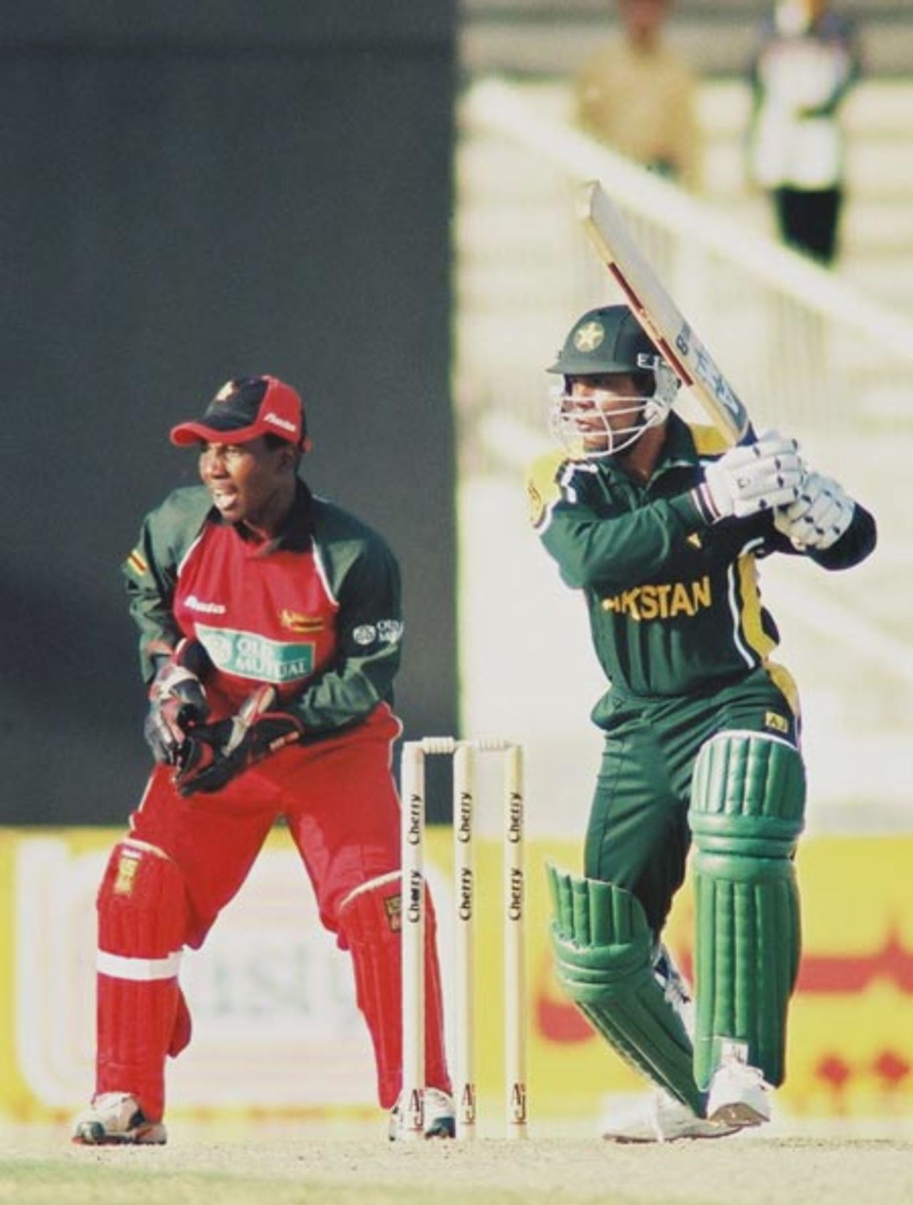 Rashid Latif stylishly plays the ball through covers, 1st Match: Pakistan v Zimbabwe, Cherry Blossom Sharjah Cup, 3 April 2003
