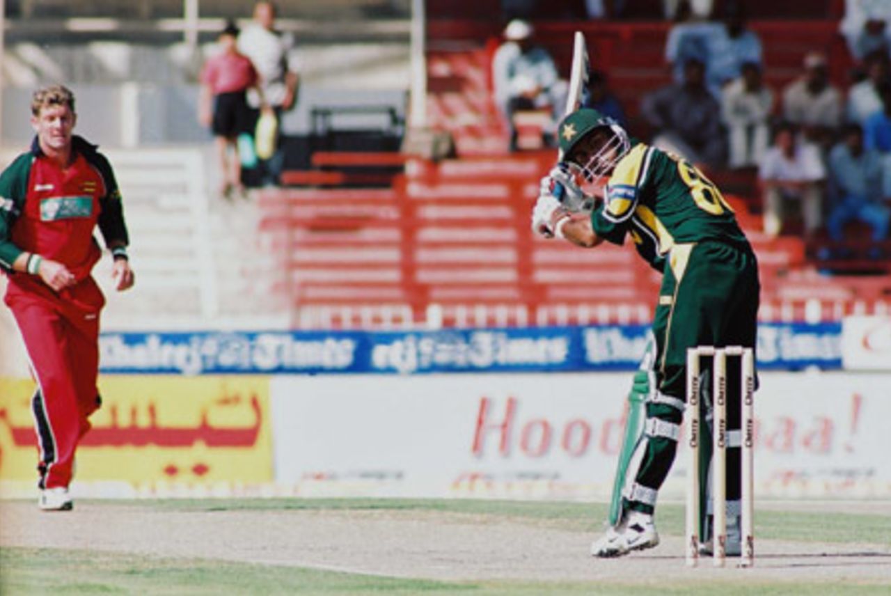 Mohammad Hafeez follows the ball as he flicks it to fine leg, 1st Match: Pakistan v Zimbabwe, Cherry Blossom Sharjah Cup, 3 April 2003