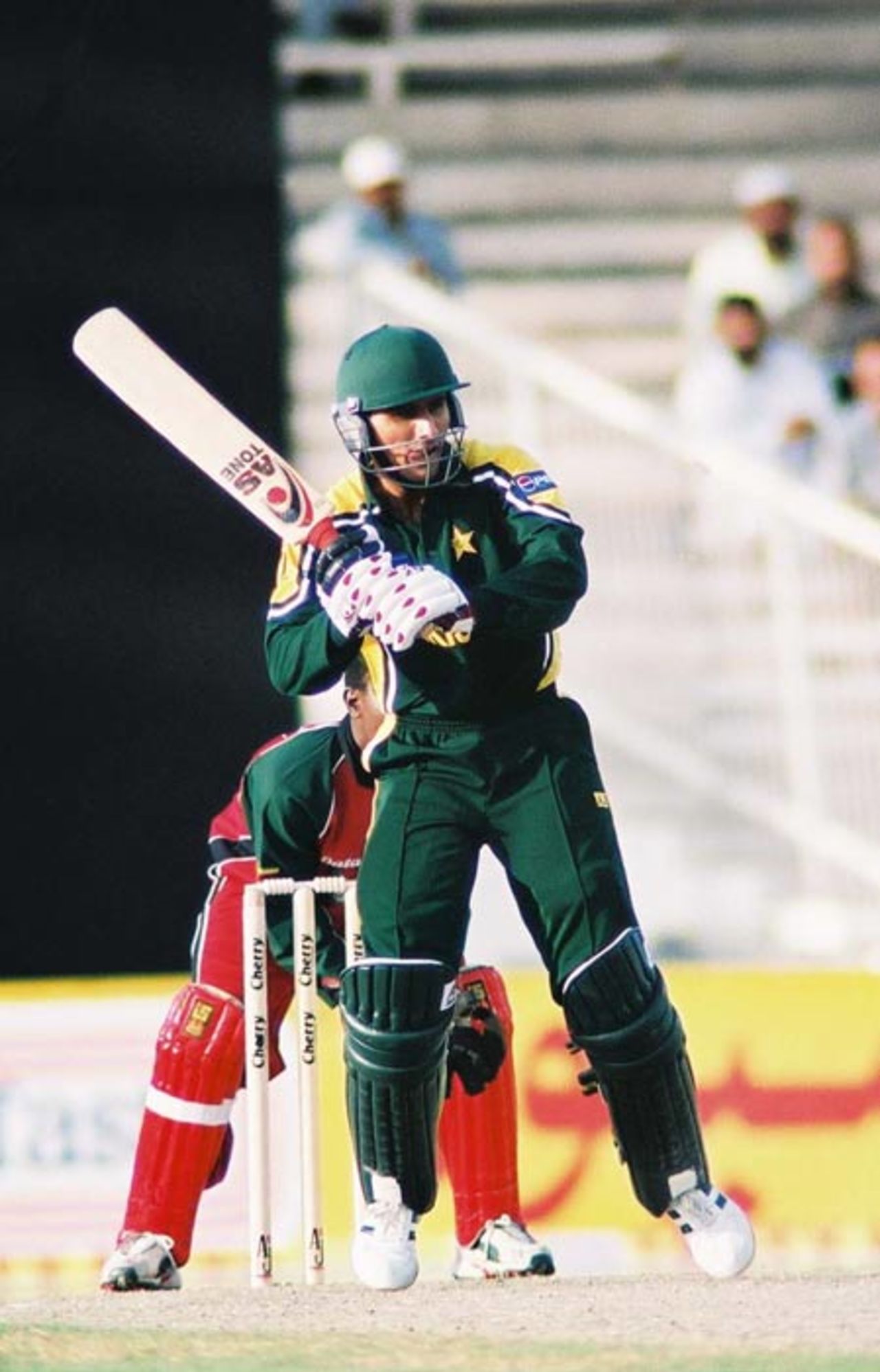 Abdul Razzaq attempts an on drive, 1st Match: Pakistan v Zimbabwe, Cherry Blossom Sharjah Cup, 3 April 2003