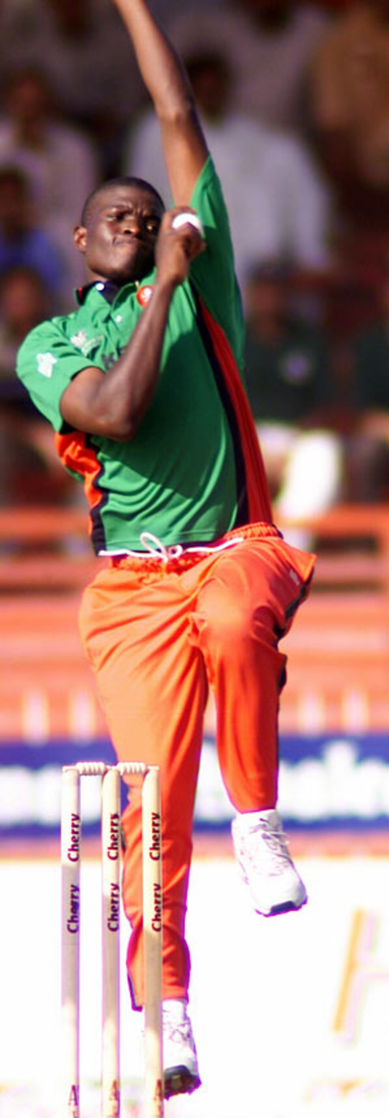 Peter Ongondo bowling, 4th Match: Kenya v Sri Lanka, Cherry Blossom Sharjah Cup, 6 Apr 2003
