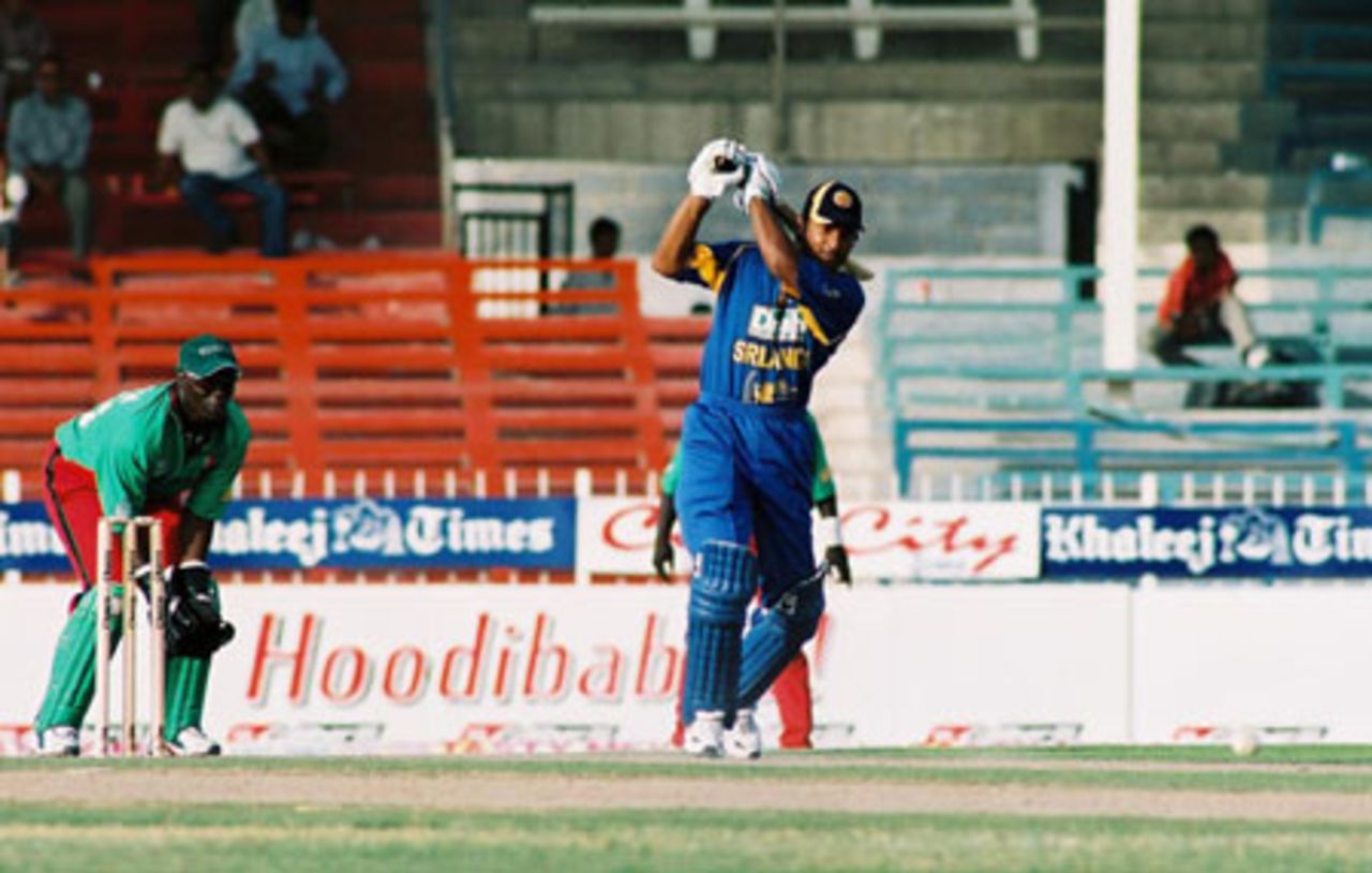 Sangakkara whacks a boundary in his lovely innings of 103, 4th Match: Kenya v Sri Lanka, Cherry Blossom Sharjah Cup, 6 Apr 2003