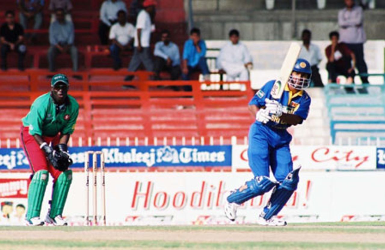 Sangakkara blasts this one toward mid wicket, 4th Match: Kenya v Sri Lanka, Cherry Blossom Sharjah Cup, 6 Apr 2003