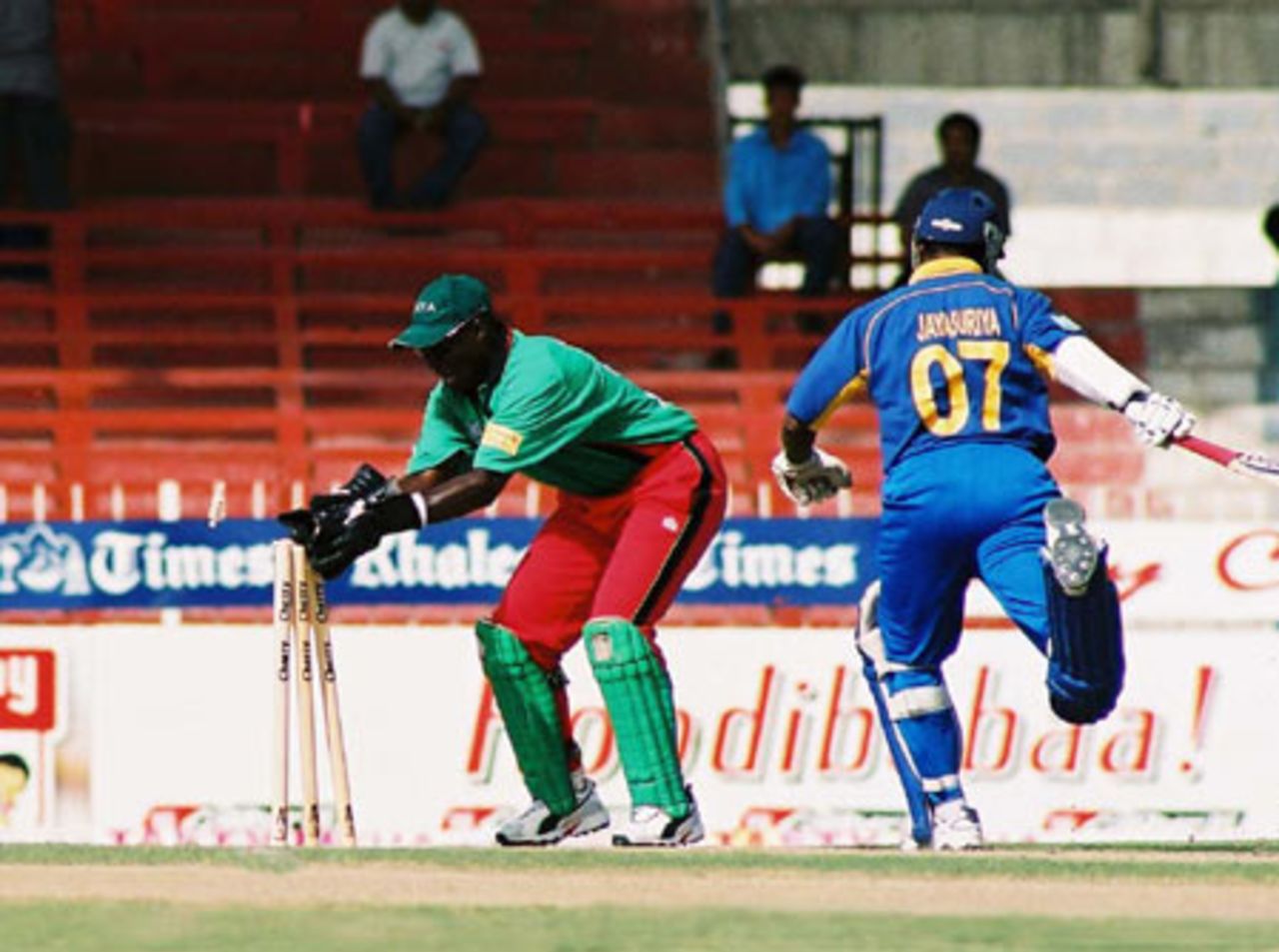 Otieno attempting to run Jayasuriya out, 4th Match: Kenya v Sri Lanka, Cherry Blossom Sharjah Cup, 6 Apr 2003