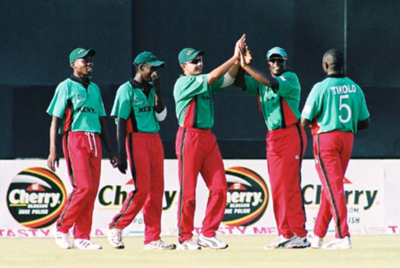 Members of the Kenya team celebrate the dismissal, 4th Match: Kenya v Sri Lanka, Cherry Blossom Sharjah Cup, 6 Apr 2003