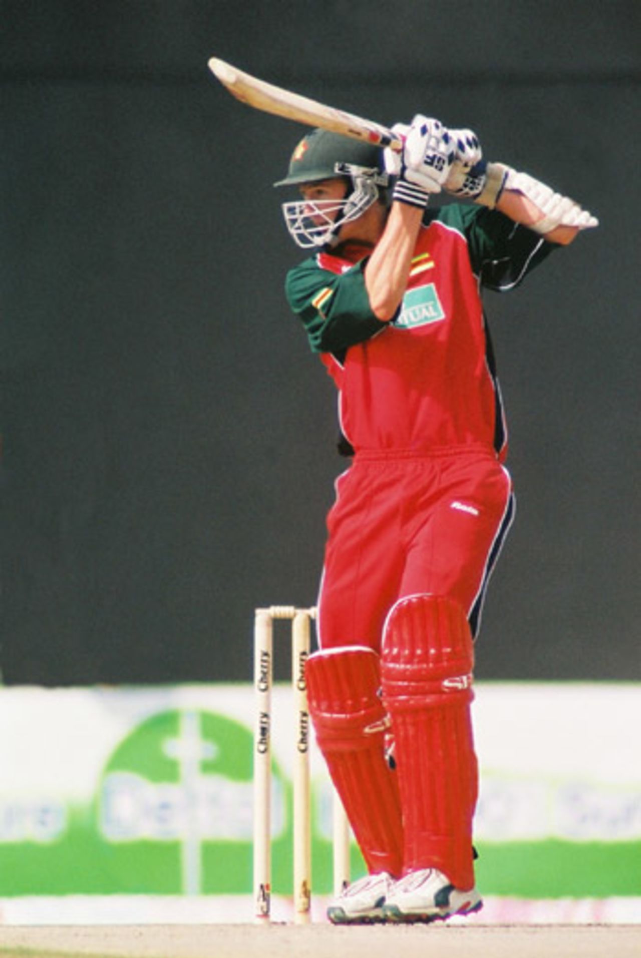 Douglas Marillier drives for a boundary, Final: Pakistan v Zimbabwe, Cherry Blossom Sharjah Cup, 10 Apr 2003