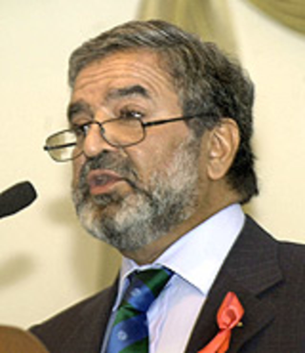 Ehsan Mani speaks at a press conference