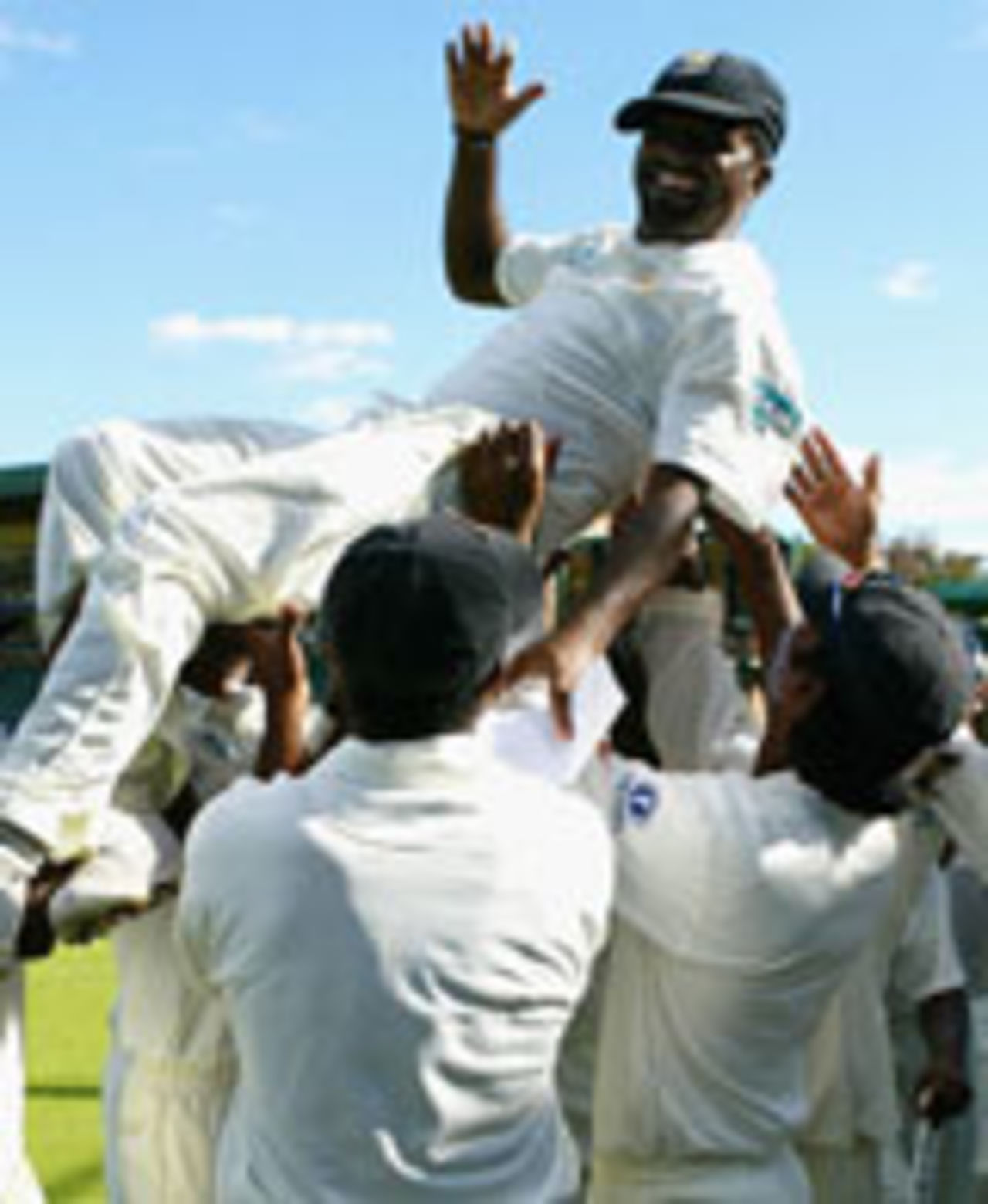 Muttiah Muralitharan being lifted up by his team-mates, Zimbabwe v Sri Lanka, 1st Test, Harare, May 8, 2004