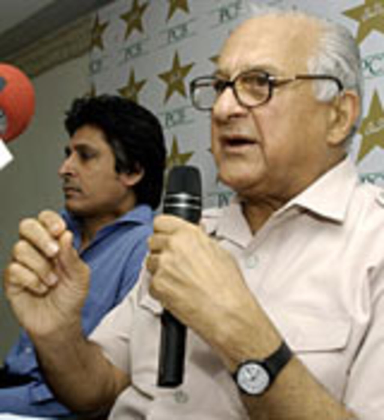 Shaharyar Khan, the Pakistan board chairman, addresses a press conference as Rameez Raja, the board's chief executive,looks on.  Shoaib Akhtar received a warning from the board. May 8, 2004