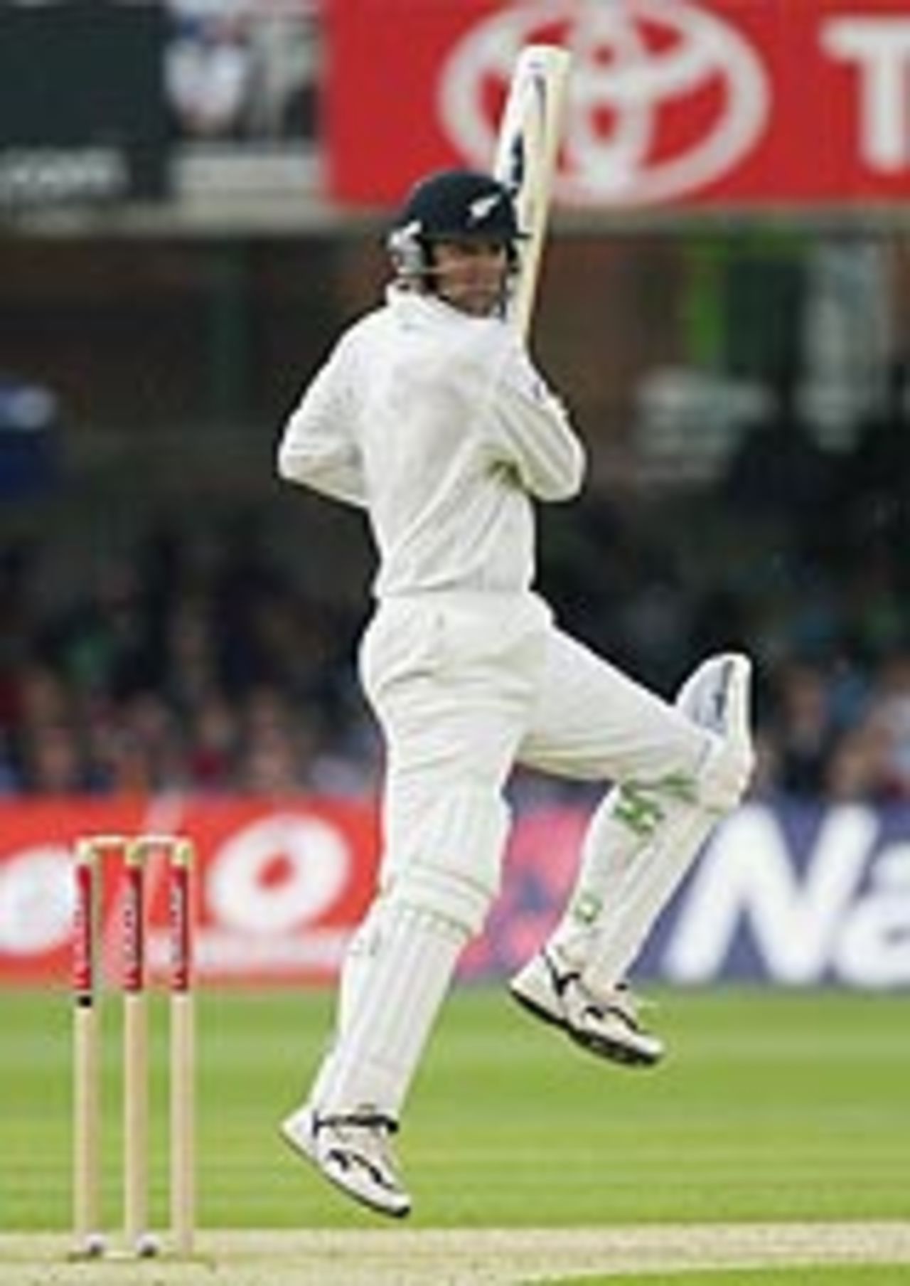Nathan Astle cuts during his innings of 64 on the first day at Lord's, New Zealand v England, May 20, 2004