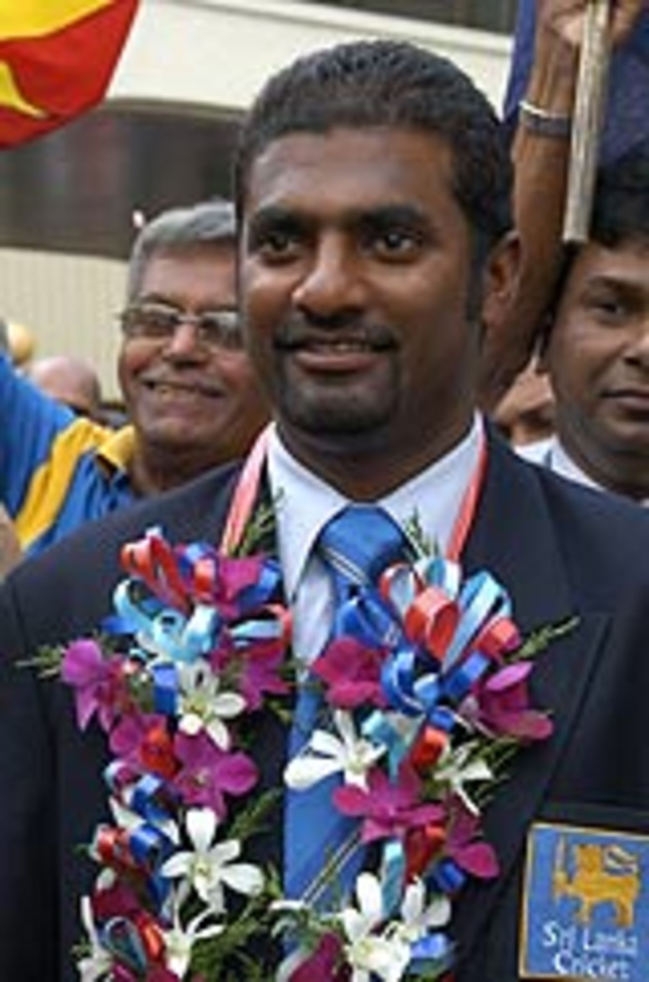 Muttiah Muralitharan garlanded at the Colombo Airport after his return from Zimbabwe, May 20, 2004