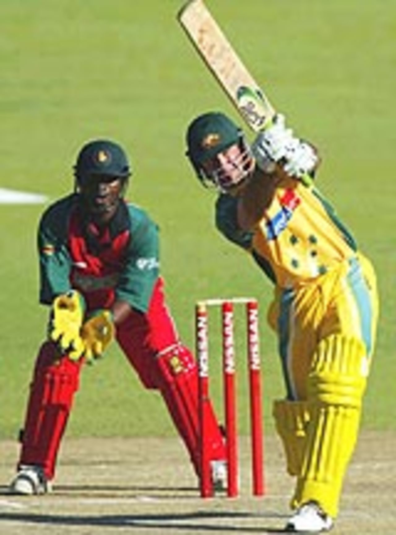 Ricky Ponting drives during his innings of 91, in the first one-day international against Zimbabwe at Harare, May 25, 2004