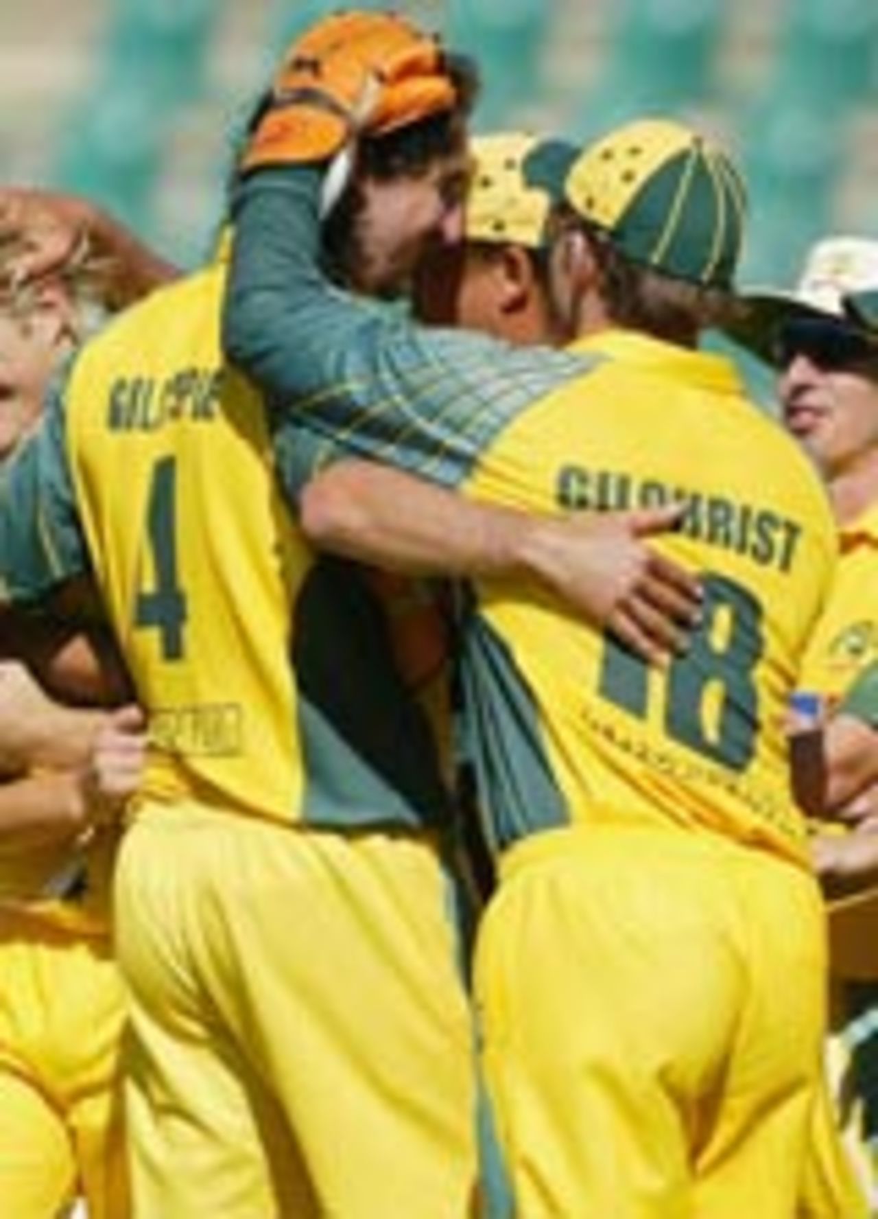 Jason Gillespie is hugged by his teammates, Zimbabwe v Australia, 3rd ODI, Harare,  May 29, 2004