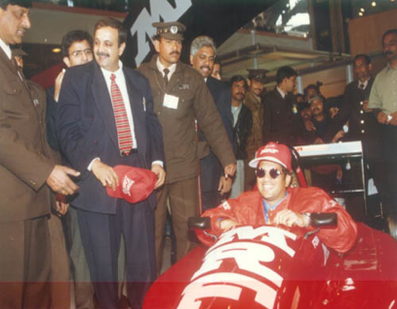 Sachin gets a feel of a Formula 1 Car while visiting the MRF Pavilion at the Auto Expo in New Delhi on 21st Jan 1998