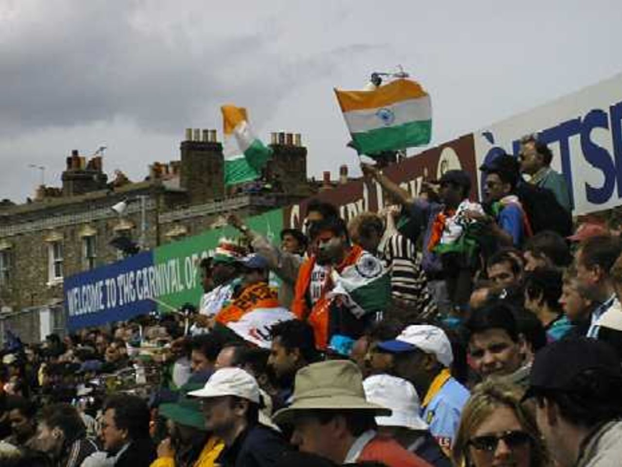 Indian fans wave flags at the Oval during the match against Australia on 4 June 1999, WC99