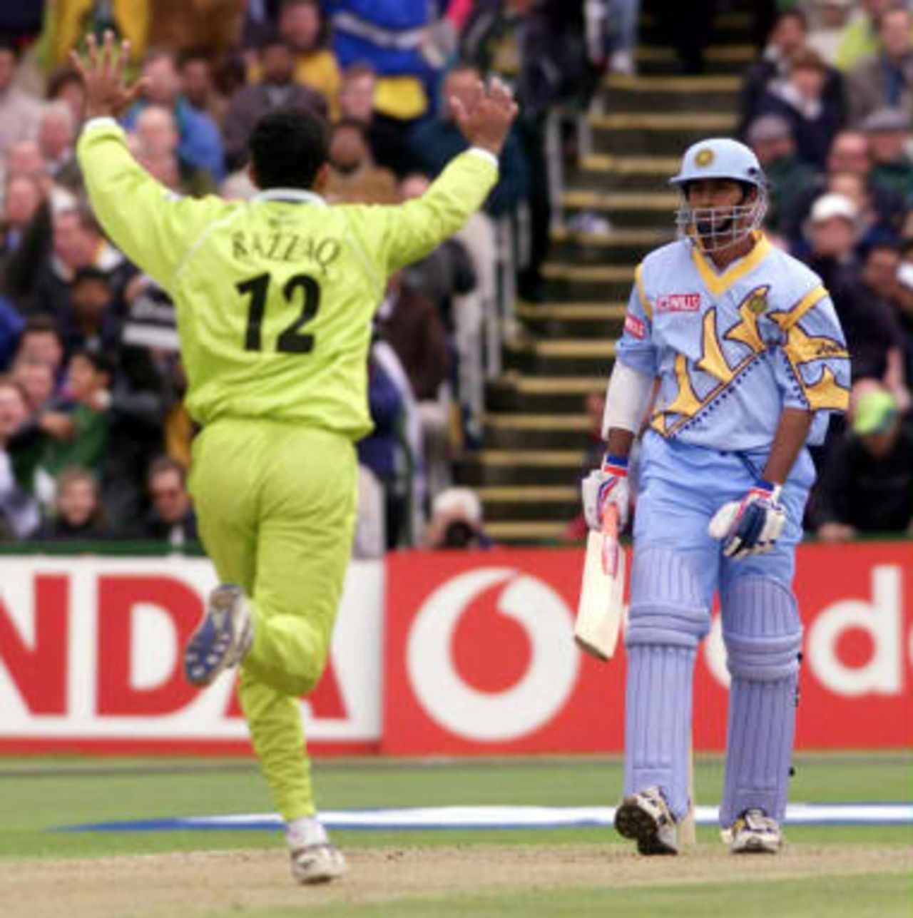 India's opening batsman Sadagopan Ramesh (R) out, bowled Abdur Razzaq 08 June 1999, during the Cricket World Cup match at Old Trafford, Manchester
