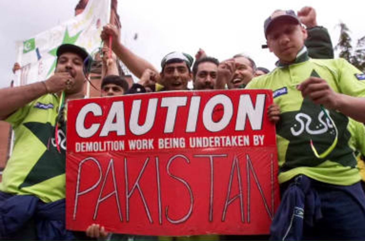 Pakistan fans add more colour to the streets of Manchester 08 June 1999 as they arrive for the World Cup Cricket clash against India at Old Trafford