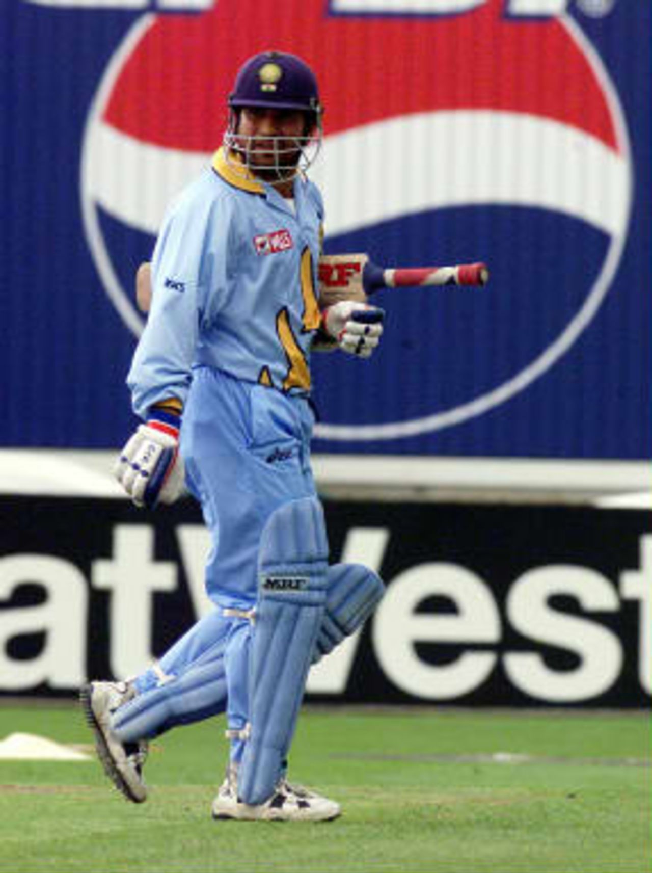 Sachin Tendulkar of India walks away from the wicket after being caught out at Old Trafford 08 June 1999 during super six match of the Cricket World Cup match in Manchester
