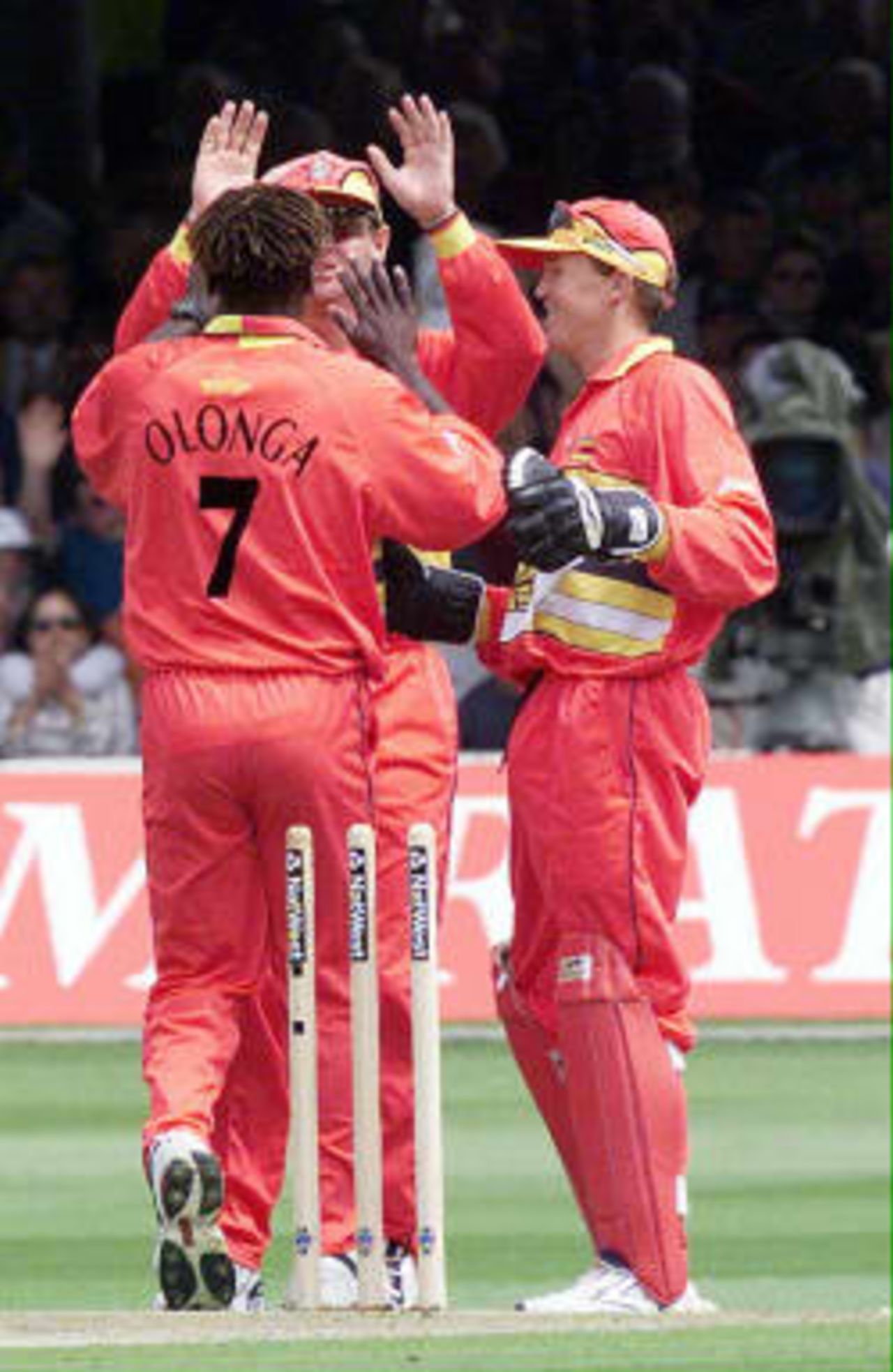 Henry Olonga celebrates after bowling out Australia`s Ricky Ponting in the match between Zimbabwe v Australia in the Cricket World Cup match at Lords 9 June 1999.