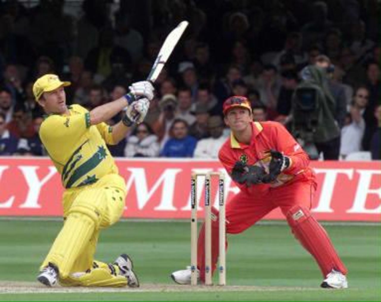 Australia`s captain Steve Waugh hits a six  during his innings of 62 in the match between Zimbabwe v Australia in the Cricket World Cup match at Lords 09 June1999, Australia scored 303 for 4