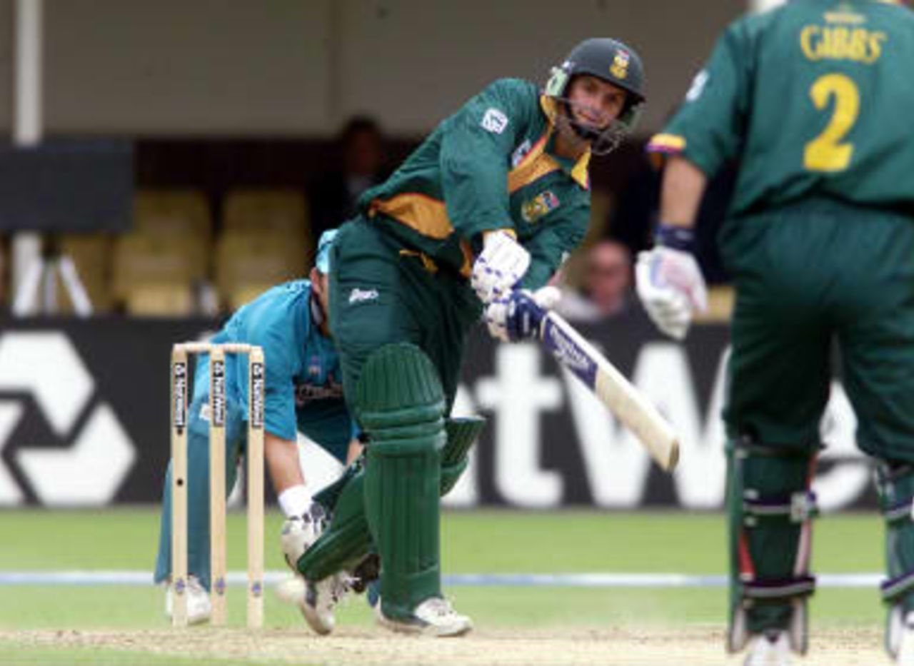 South Africa's Gary Kirsten hits a four on his way to making 82 runs off the bowling of New Zealand's Gavin Larsen 10 June 99, during their Super Six match in the Cricket World Cup at Edgbaston, Birmingham. The final will be at Lords on the 20 June 99