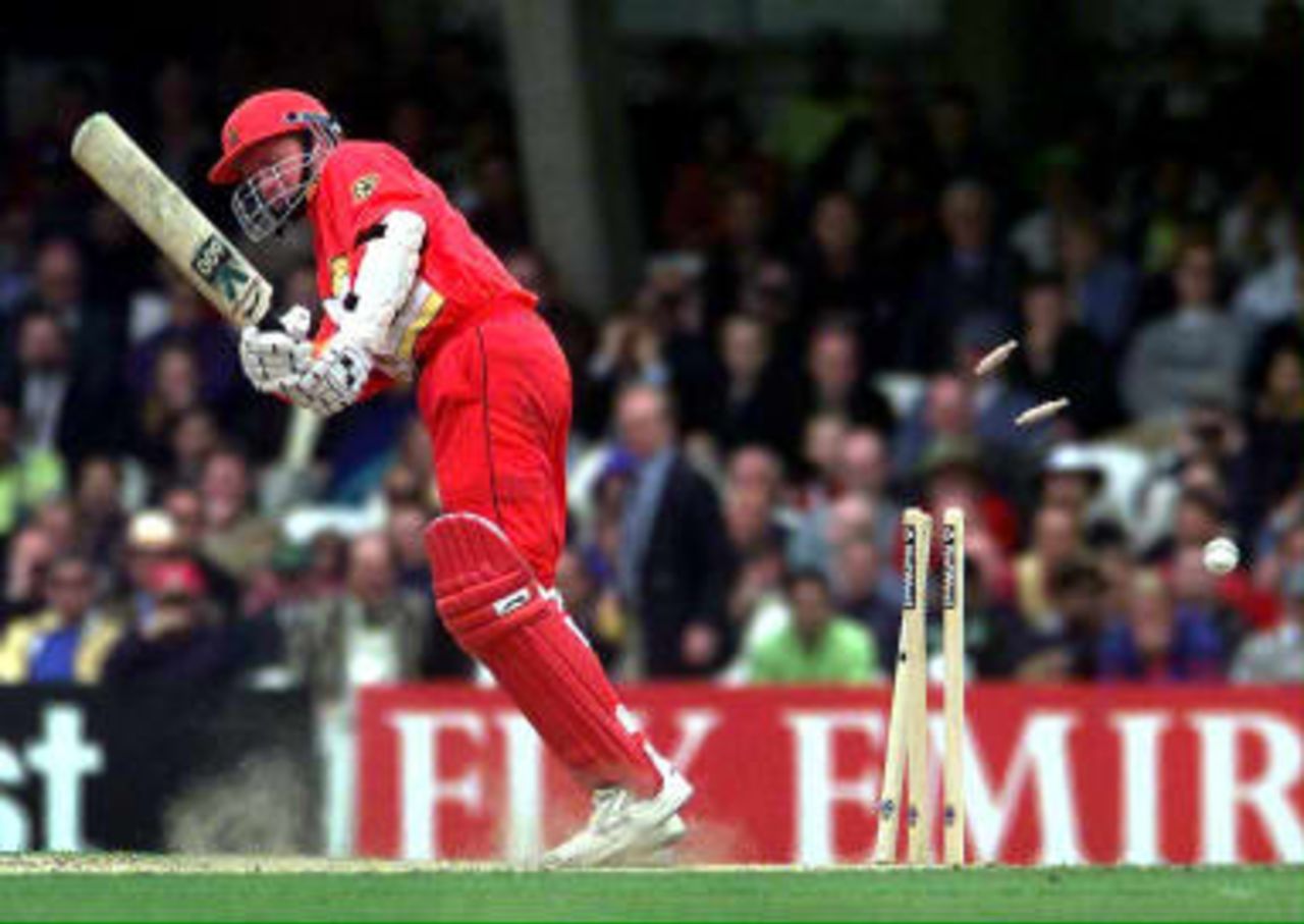 Zimbabwe opening batsman Grant Flower is clean bowled for two by Pakistan's Shoaib Akhtar during their Cricket World Cup Super Six match at The Oval in London 11 June 1999 1999