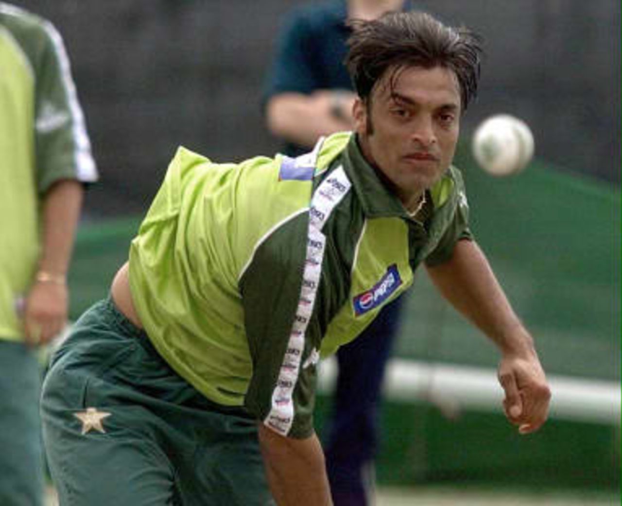 Pakistan pace bowler Shoaib Akhtar keeps his eye on the ball during a nets practice session at Old Trafford, Manchester 15 June 1999 prior to his sides Cricket World Cup Semi Final match against New Zealand 16 June 1999