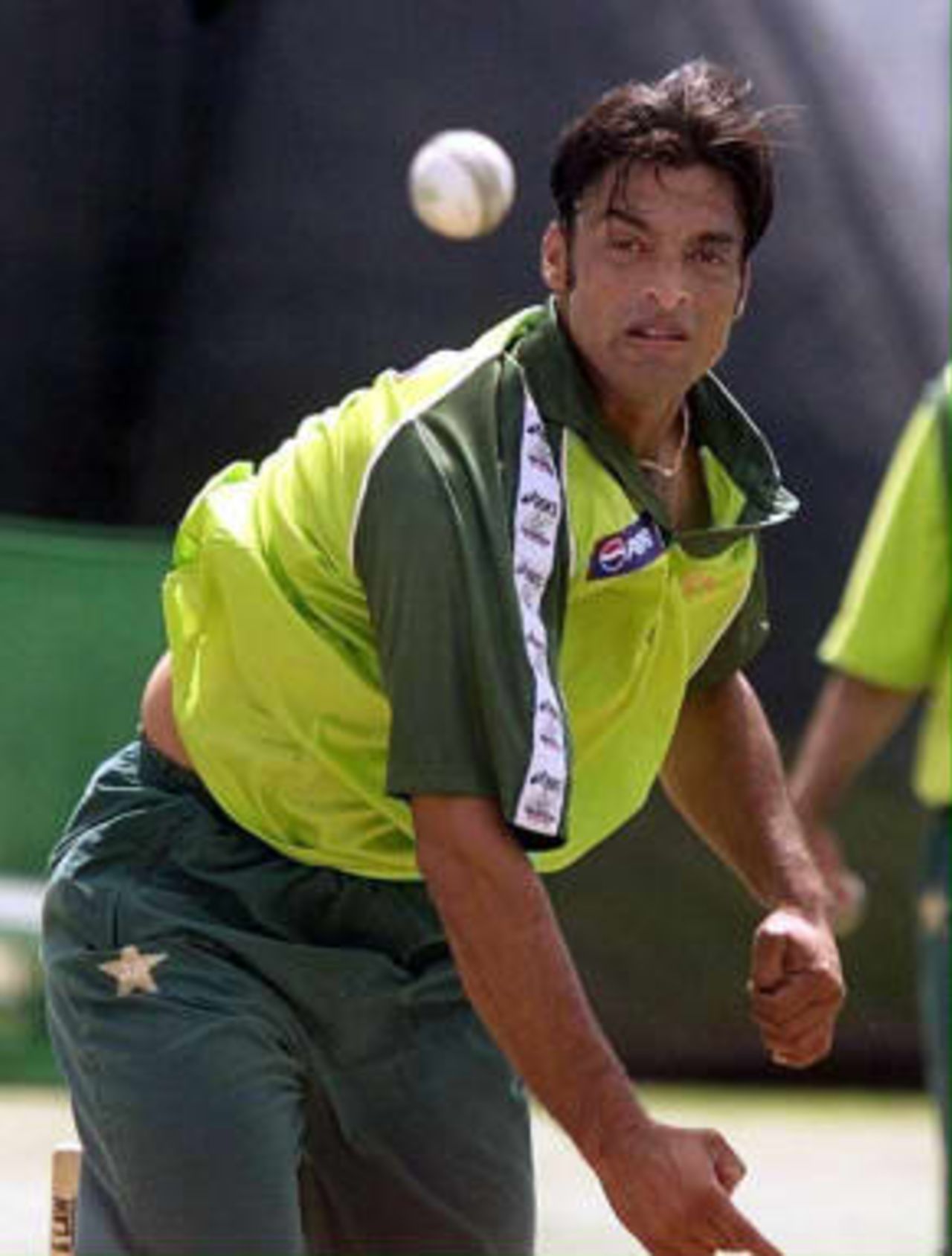 Pakistan pace bowler Shoaib Akhtar keeps his eye on the ball during a nets practice session at Old Trafford, Manchester, 15 June 1999 prior to his sides Cricket World Cup semi final match against New Zealand 16 June 1999