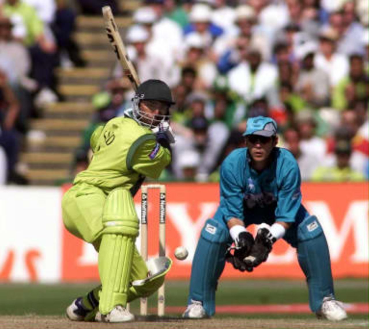 Pakistan batsman Saeed Anwar hits a four on his way to his century during the Cricket World Cup semi final at Old Trafford, Manchester, 16 June 1999.