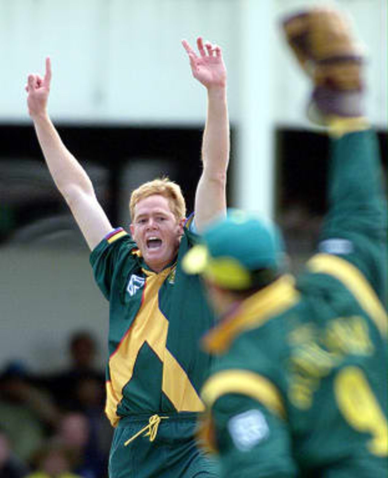 South Africa's Shaun Pollock (L) celebrates with wicketkeeper Mark Boucher after Australia's Glenn McGrath was bowled out to bring the innings to an end with Pollock taking 5 for 36 runs 17 June 1999, during their semi-final match in the Cricket World Cup at Edgbaston, Birmingham. The final will be at Lords in London 20 June 1999