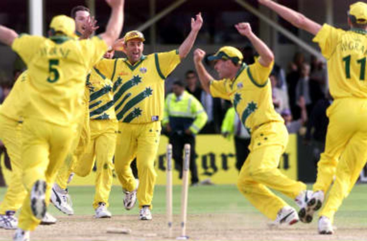 Australian cricket team celebrates after it run out Allan Donald in the final for victory over South Africa during their semi-final match in the Cricket World Cup at Edgbaston, Birmingham, 17 June 1999.