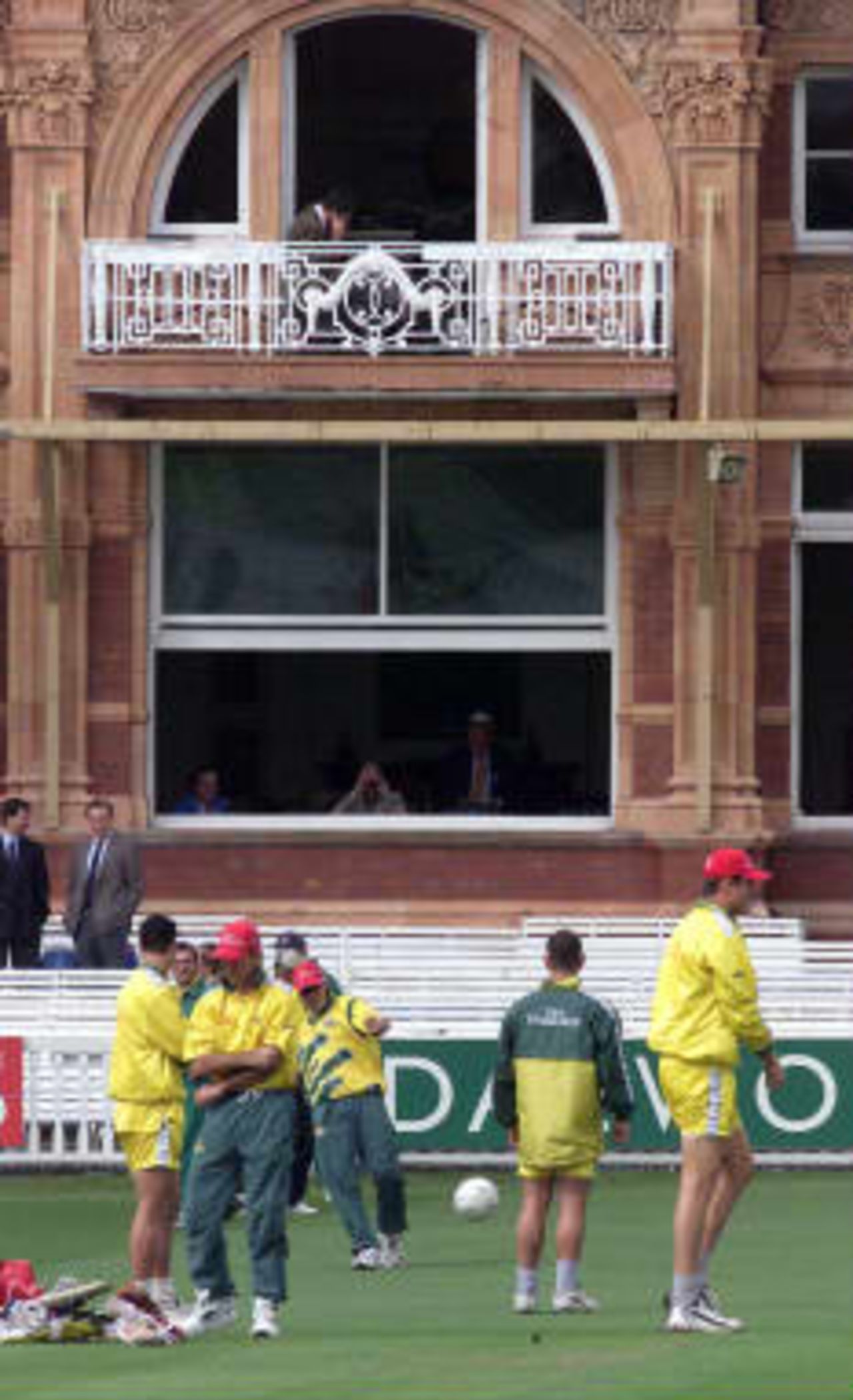 Members of the Australian team examine the pitch before putting in some light training 20 June 1999 before the start of the World Cup Cricket final against Pakistan at Lords in London