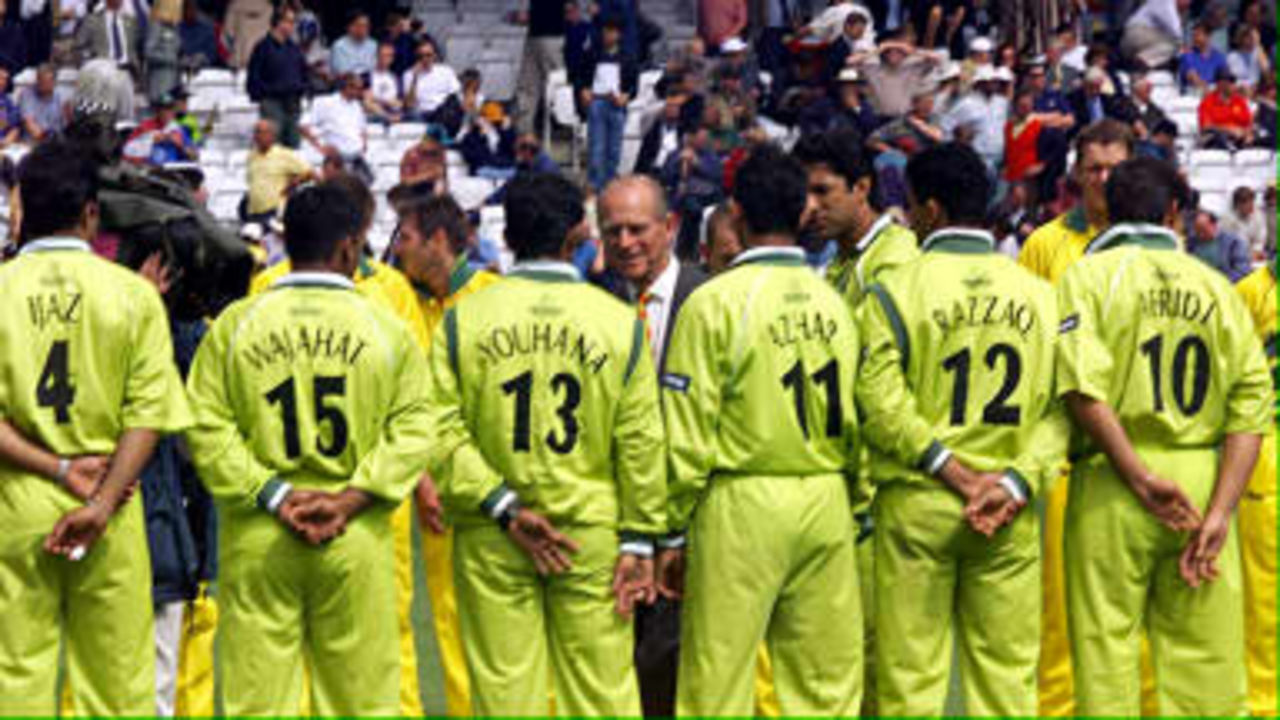 The Duke of Edinburgh (C) is introduced to the Pakistan team before the start of the Cricket World Cup final against Australia at Lords in London 20 June 1999. The Duke attended 19 June 1999 the wedding of his son, Prince Edward, to Sophie Rhys-Jones at Windsor castle