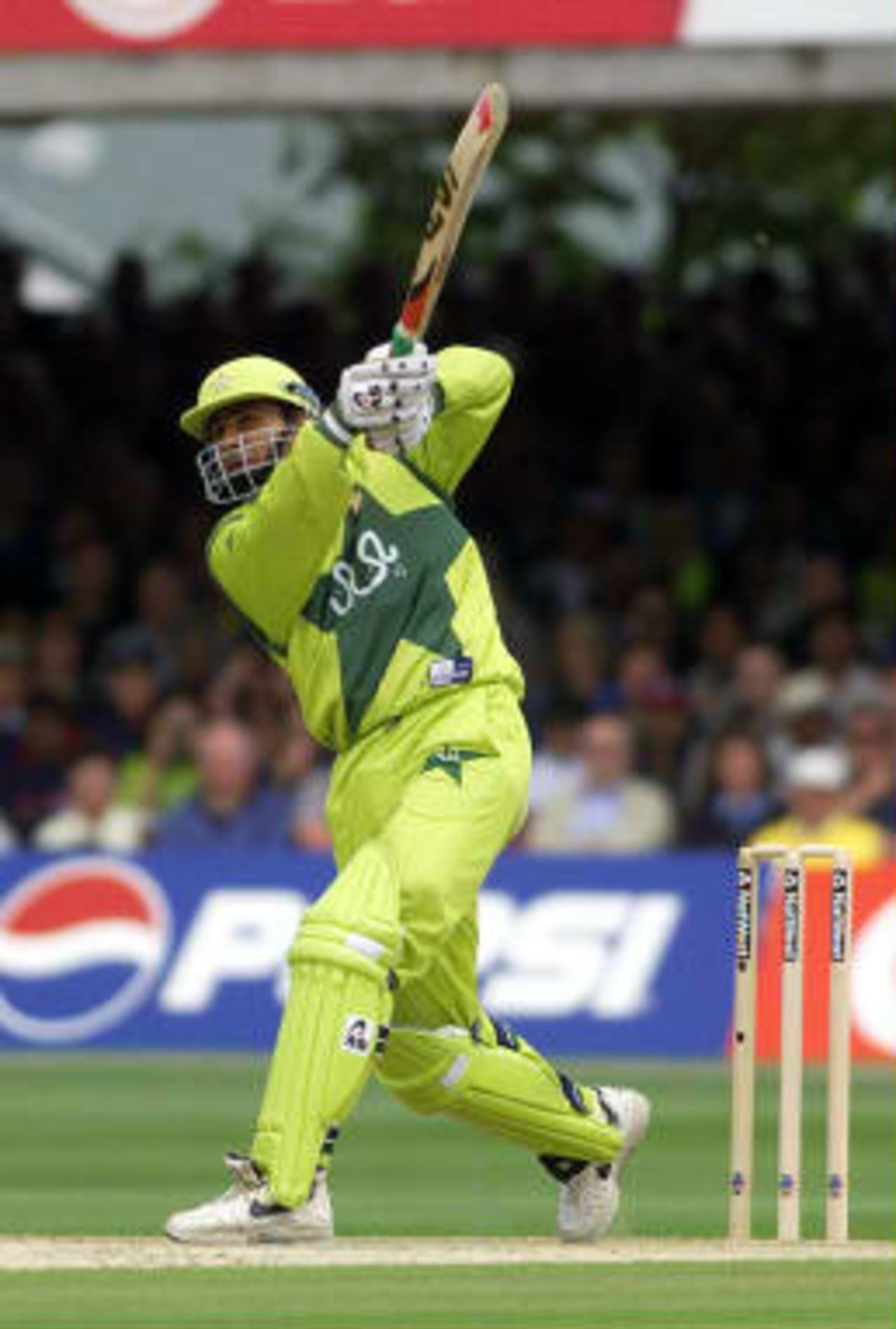 Pakistan's Abdur Razzaq hits out off the bowling of Australia's Glenn McGrath 20 June 1999 during the Cricket World Cup final at Lord's, London