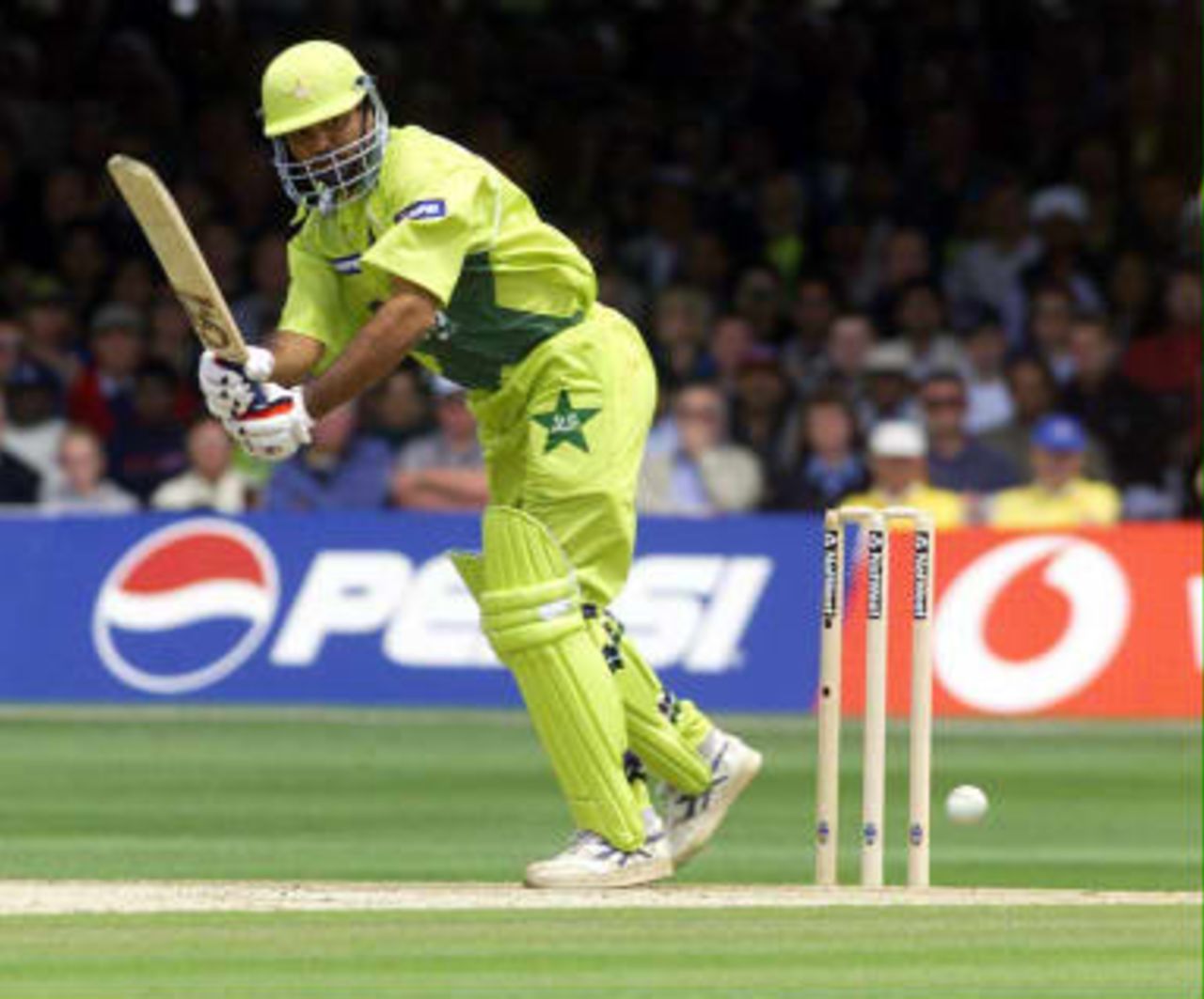 Pakistan's Ijaz Ahmed hits out off the bowling of Australia's Glenn McGrath 20 June 1999 during the Cricket World Cup final at Lord's